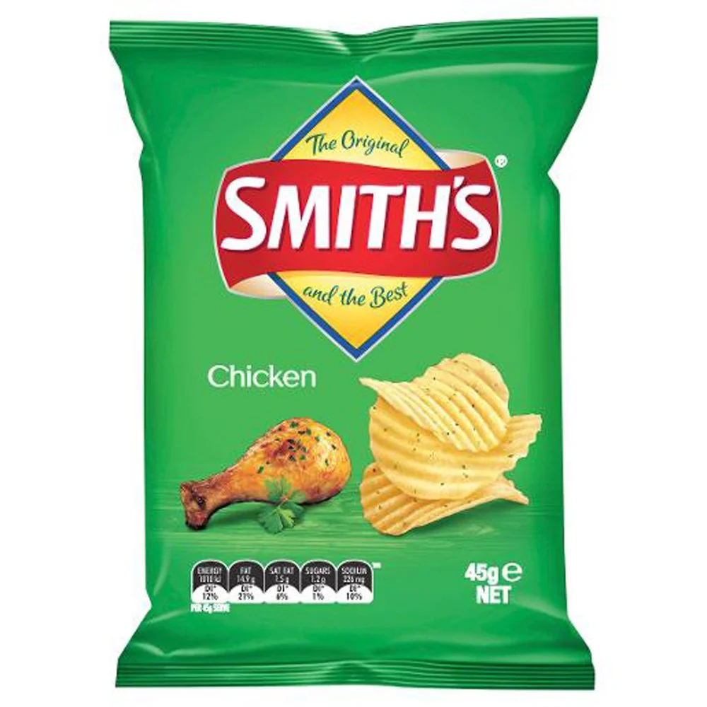 Green bag of Smith's Chicken flavored ridged potato chips with an image of a cooked chicken drumstick and ridged potato chips on the front.