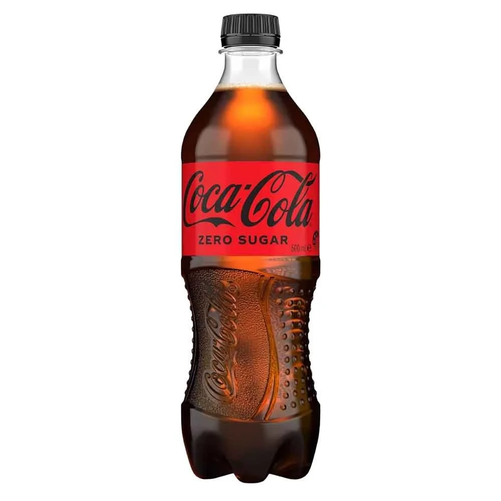 A 500 ml bottle of Coca-Cola Zero Sugar with a red label and black cap.