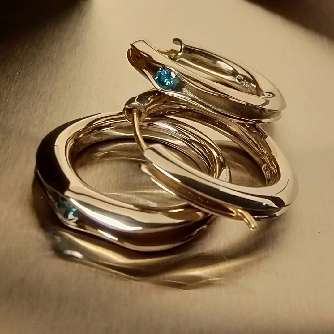 White gold earrings and a ring