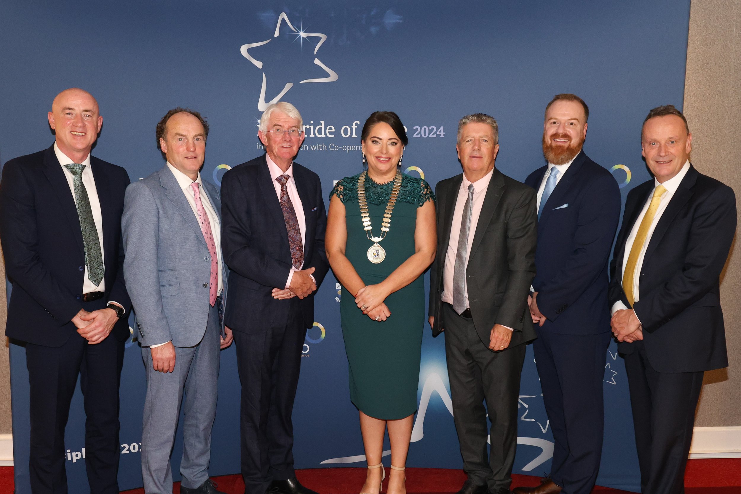 Robert Burns, Chief Executive of Monaghan County Council, John Hogan, Chair and Group Non-Executive IPB, Tom Dowling, Pride of Place Chairperson, Cllr Cathy Bennett, Cathaoirleach of Monaghan County Council, and John Kearns, Chief Executive Officer a