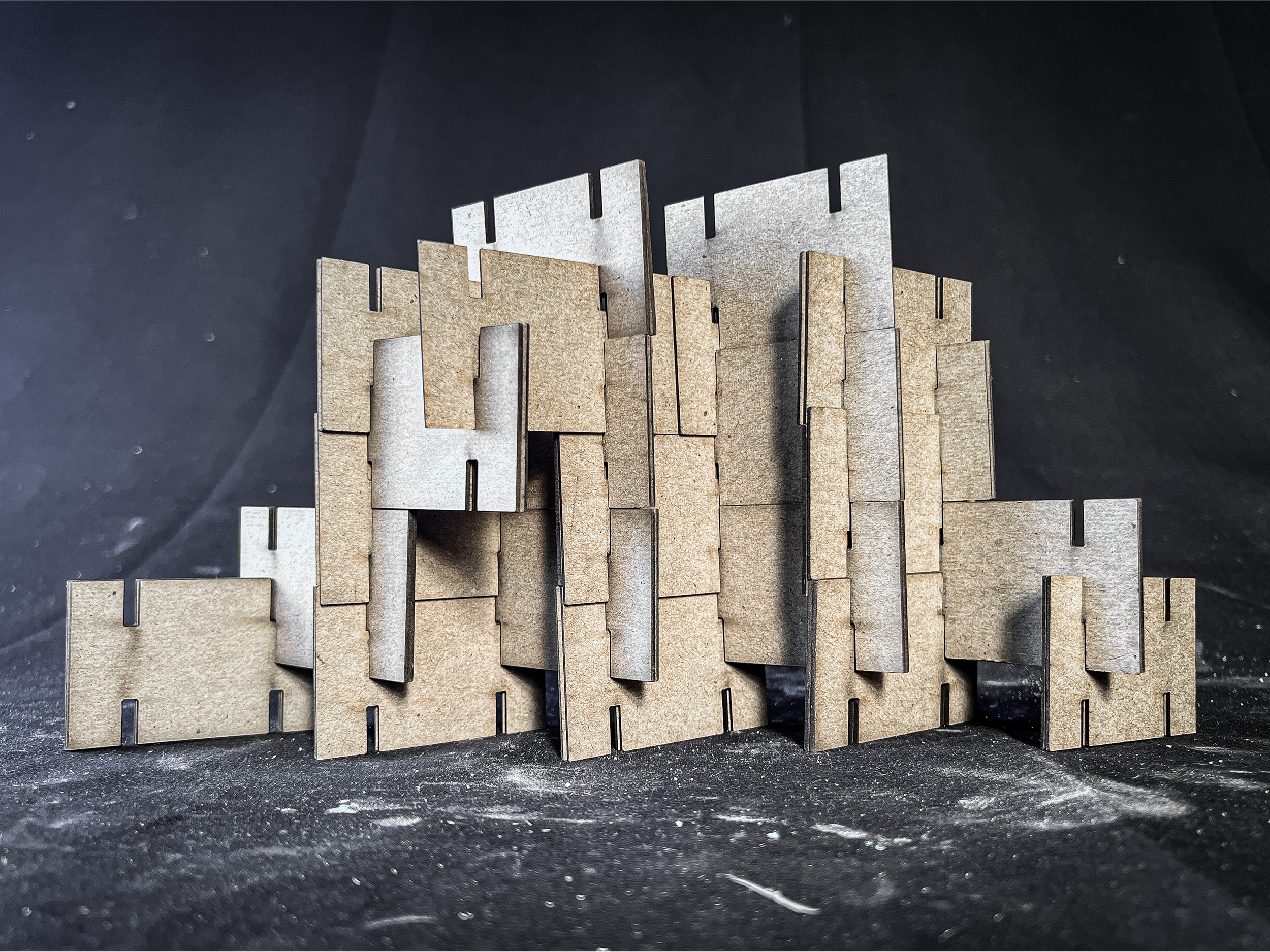 Modular wall made from puzzle - like panels, the loose joinery allowed for the wall to expand and contract like an accordion.
(Laser cutter)