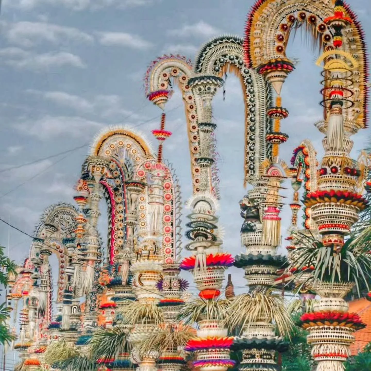 During the Galungan and Kuningan celebrations in Bali, Balinese people put up penjor, a decorated bamboo pole symbolizing prosperity and gratitude.