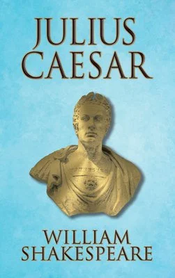 Book cover of Julius Caesar by William Shakespeare, featuring a bust-style portrait of Julius Caesar.
