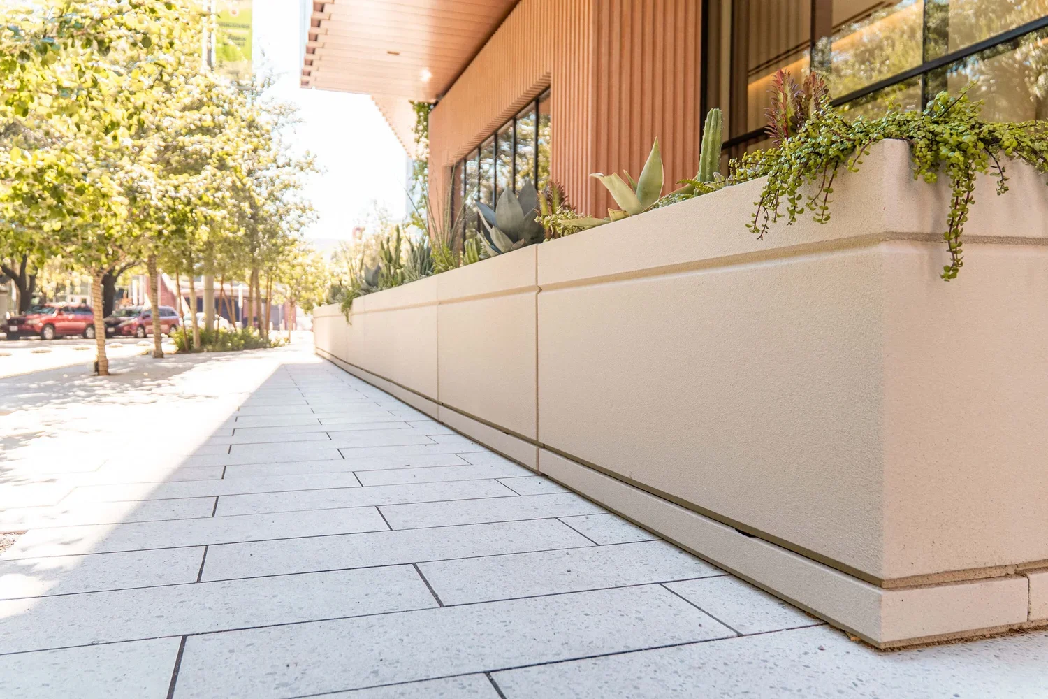 The Art of Custom Planters: Using Planters as Visual Anchors in Your Building's Design