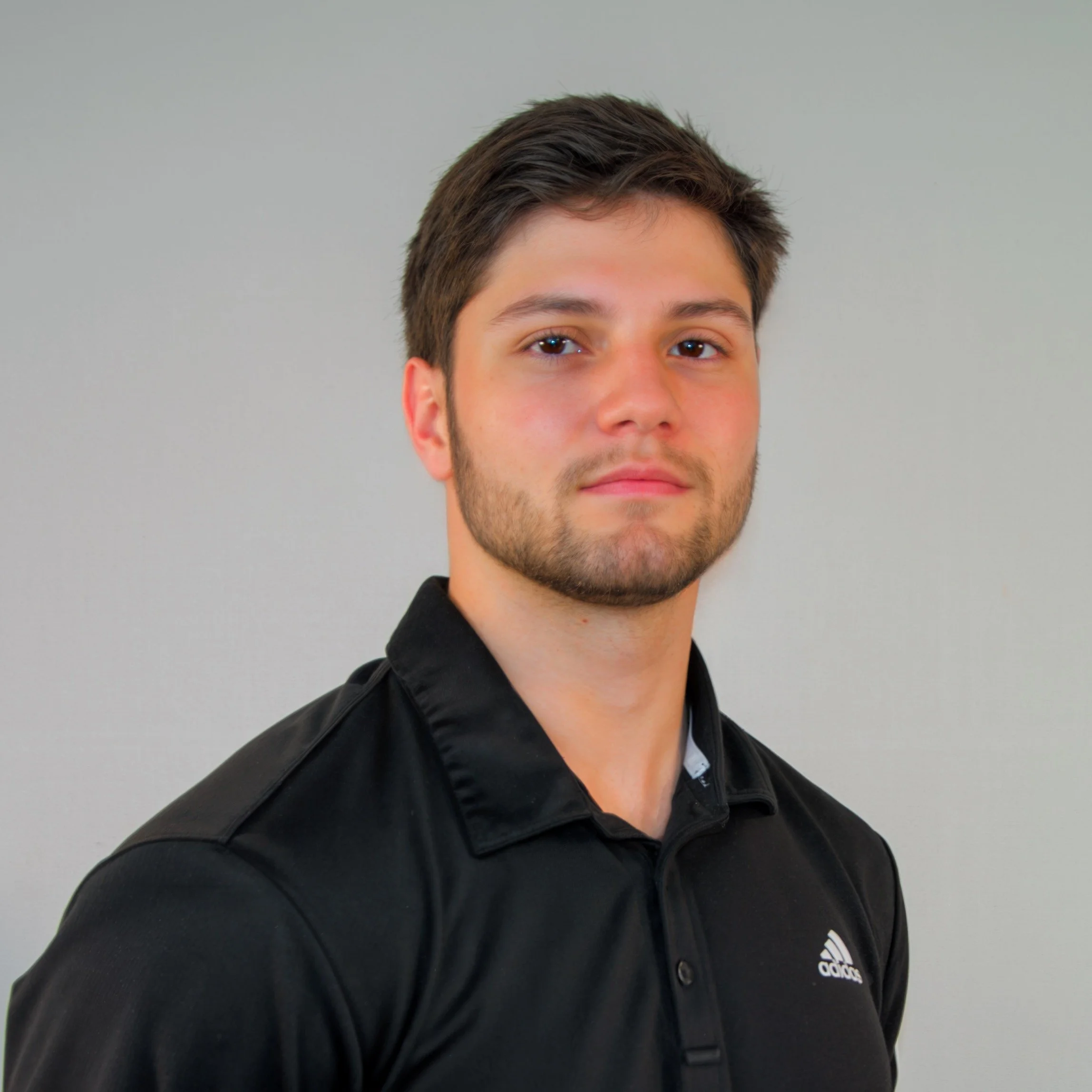 Portrait of Cayson Schjott, Sports Psychology M.S. and founder of Psychology Supports Performance