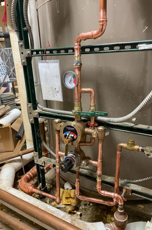 Plumbing system with copper pipes and gauges