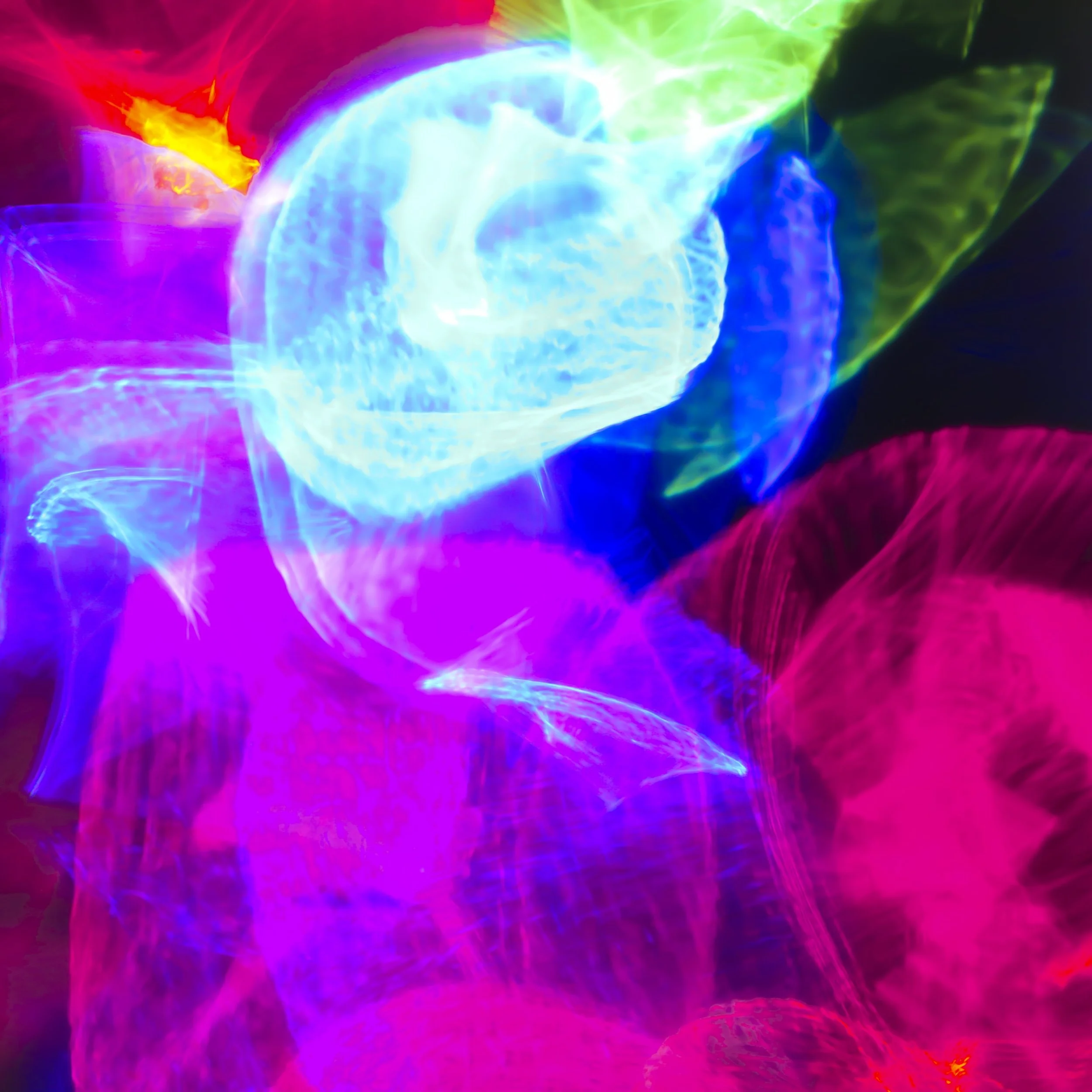 Koula Pratsis - 
Western Australia.

"Spectral Surge" 
Macro photography (light refracted through glass)
16 x 16 in