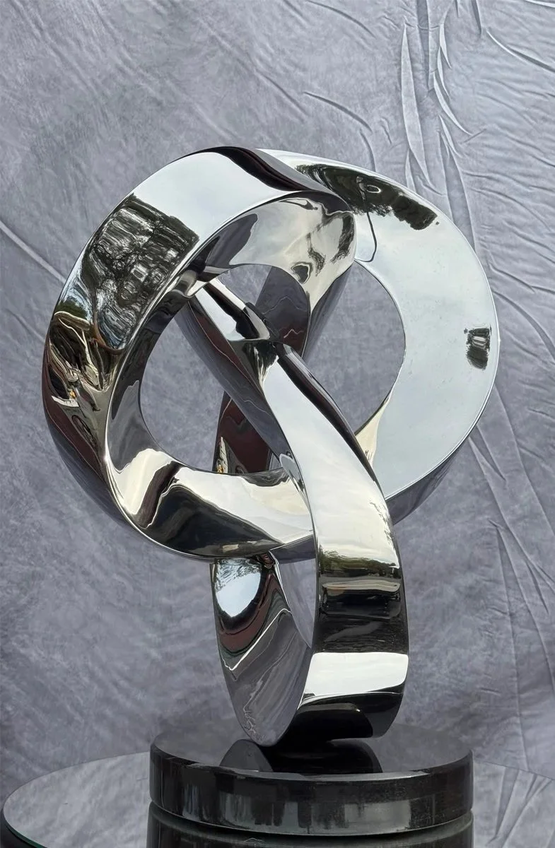 T Barny -  Healdsburg, California - "Circo Q - 'To Traverse'" 
Staineless Steel
17 x 24 in