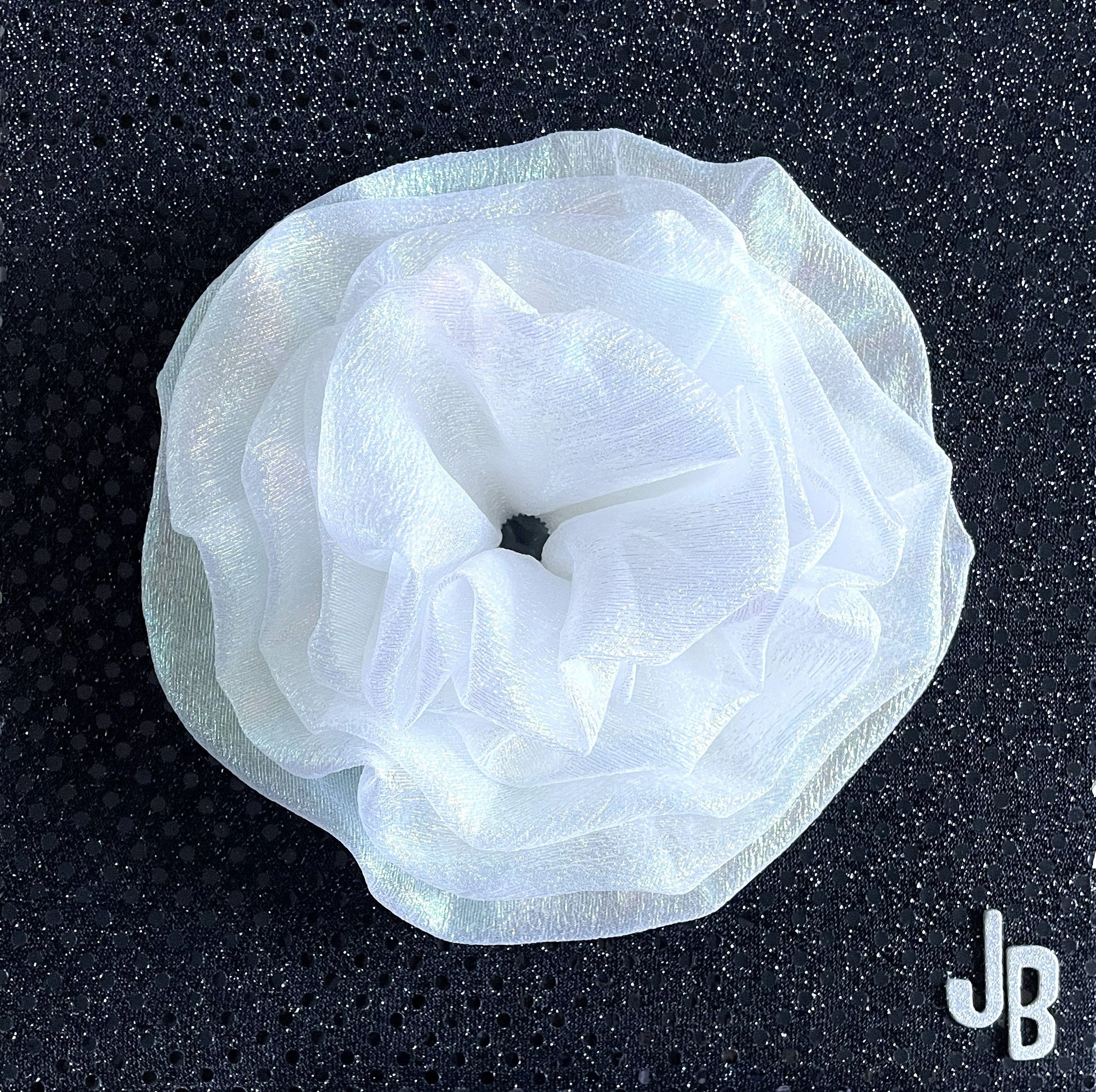 Joelle Bilisari - 
Louisville, Kentucky. "Ethereal Bloom"
Textile
10 x 10 in