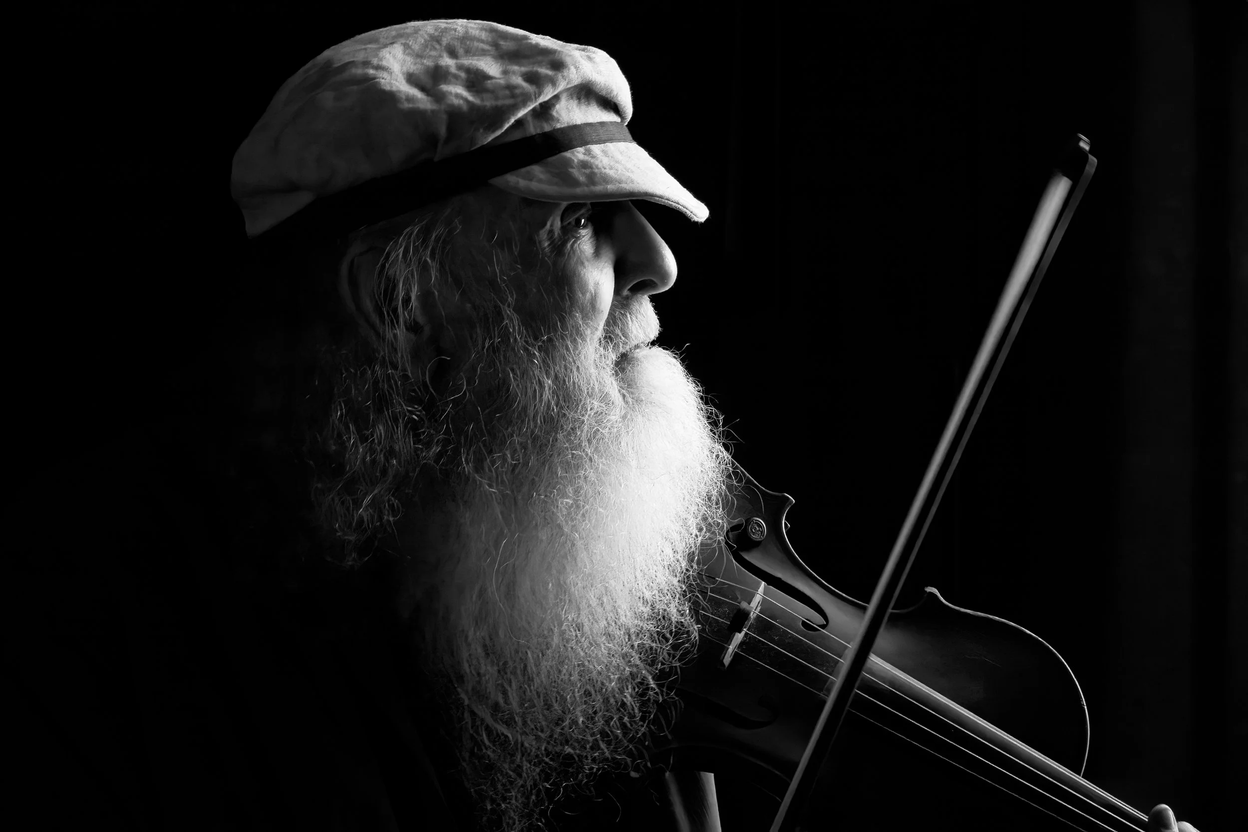 The Sad Fiddler, 18 x 12 in, photography, archival pigment print (2nd place Winning piece of the Black & White juried art competition)