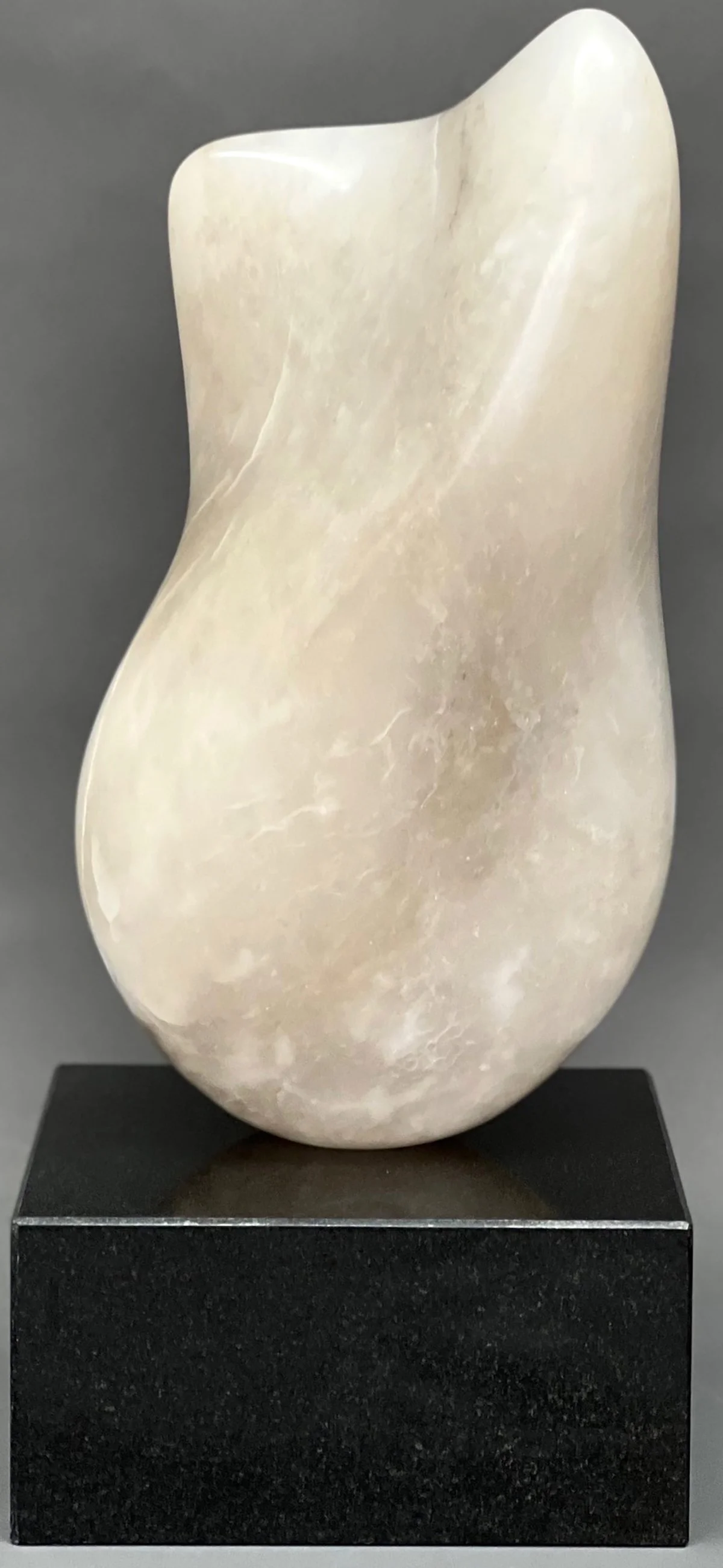 Lilian R Engel - New York, New York - "Awakening” 
Alasbaster on granite
8 × 19 in