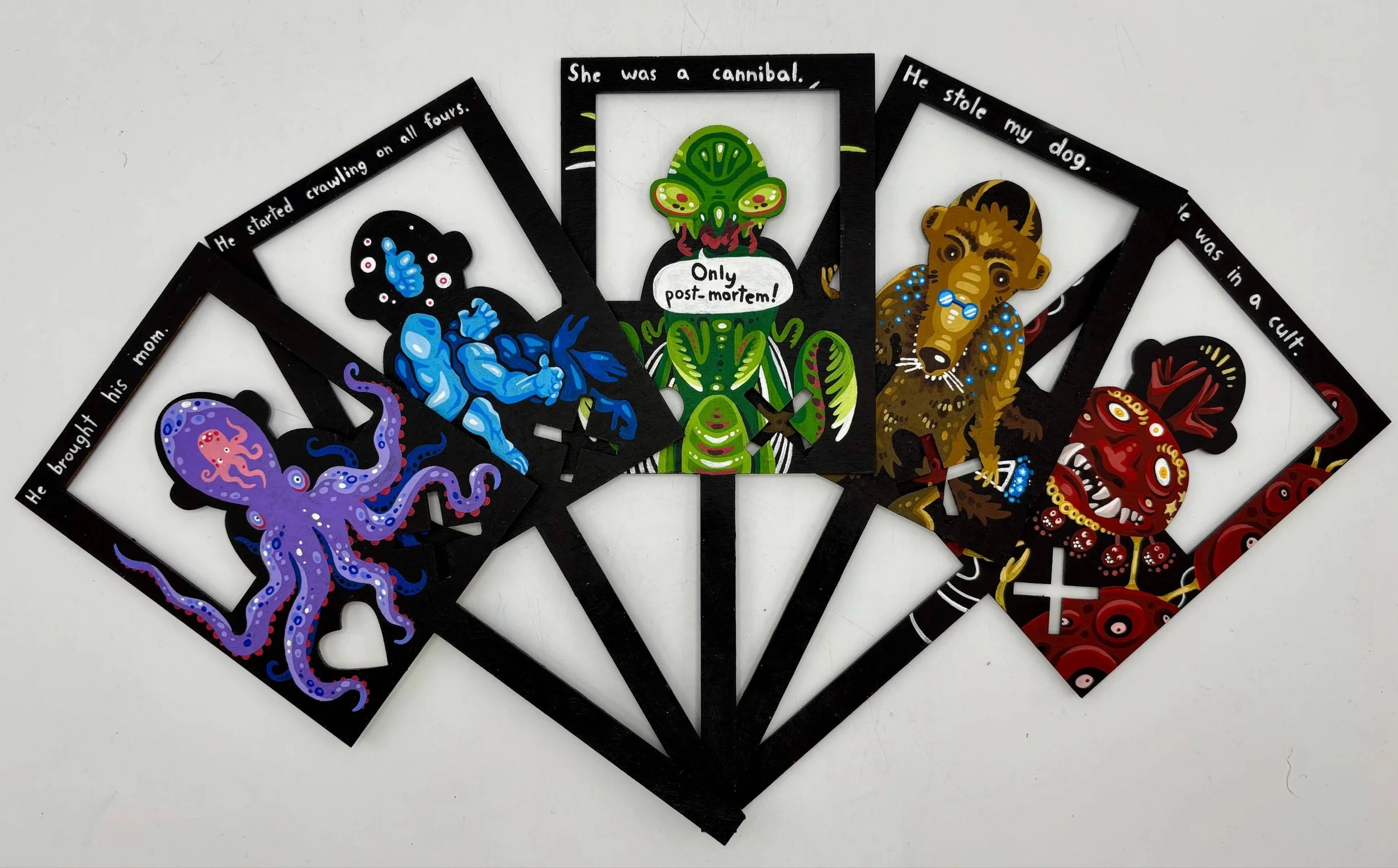 “Tinder Terror”, each portrait is 5 x 6 x 4 inches, acrylic on laser-cut wooden templates. 