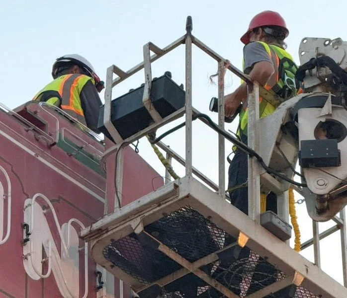  YESCO, the sign vendor contracted by the City and the sign’s original fabricator, working on replacing the sign. Photo by Marc Johnson. 