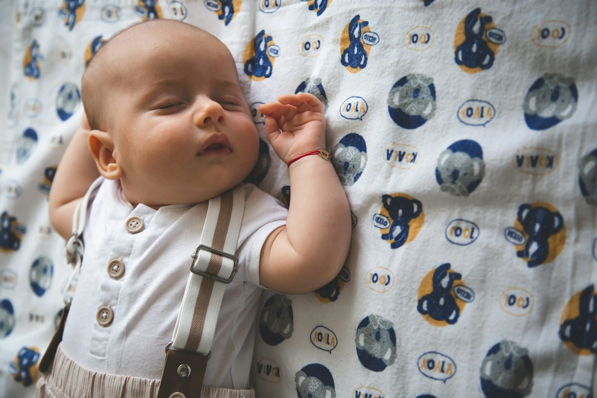Sleeping baby representing infant sleep support from a Houston pediatric sleep consultant