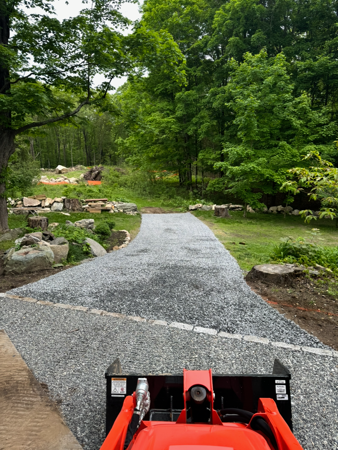 driveway renovations with truck and tools