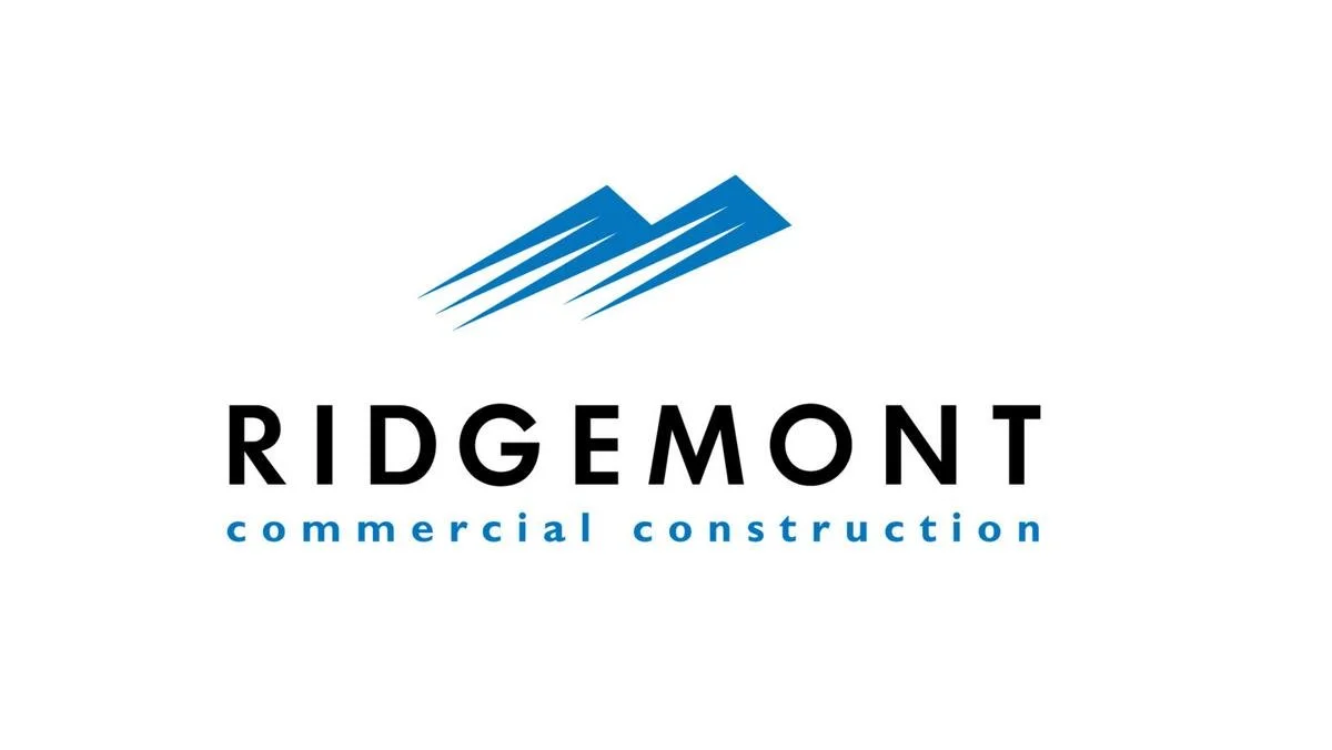 Logo for Ridgemont Commercial Construction featuring stylized blue mountain graphic and company name.