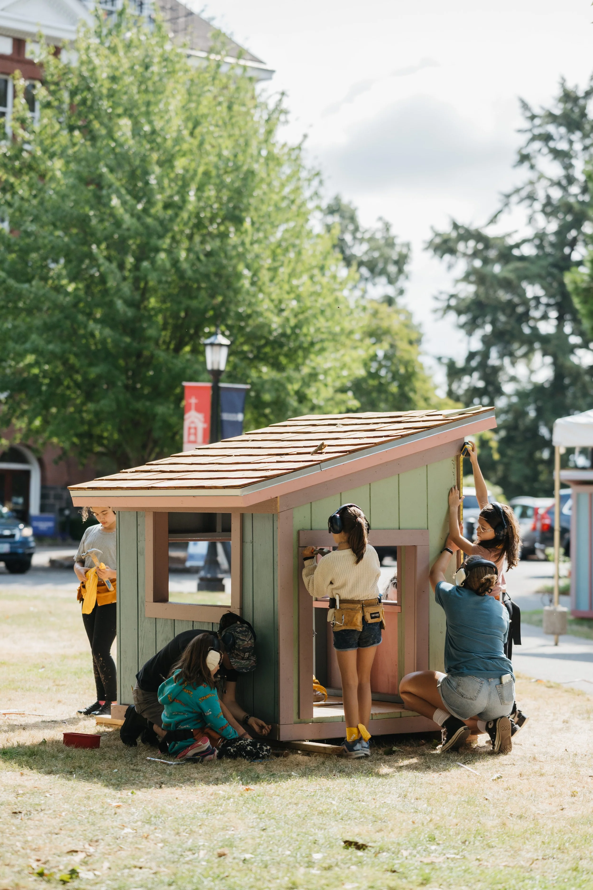 Campers working on playhouse.jpg