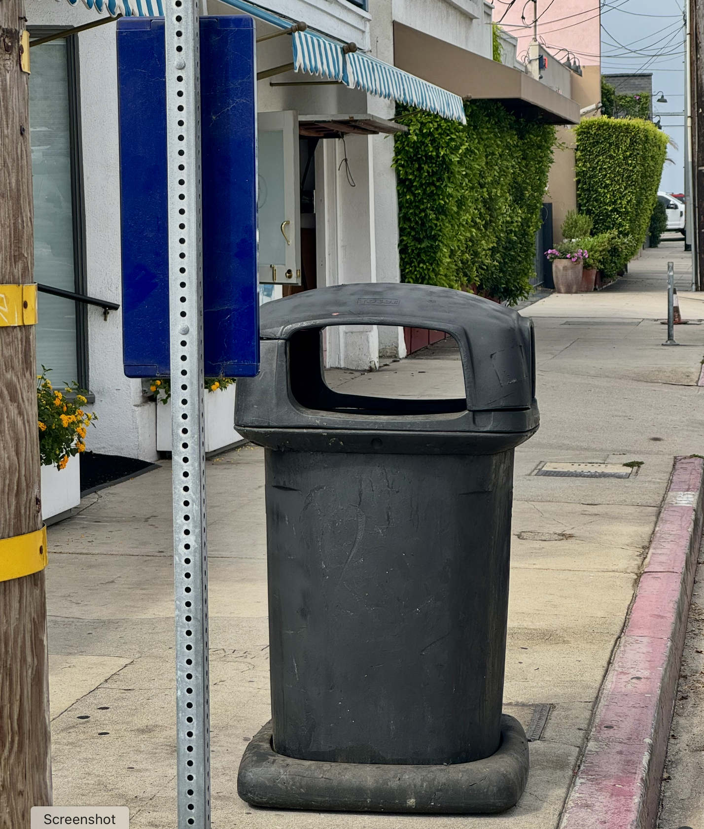 The Case of the Disappearing &amp; Reappearing Trash Cans