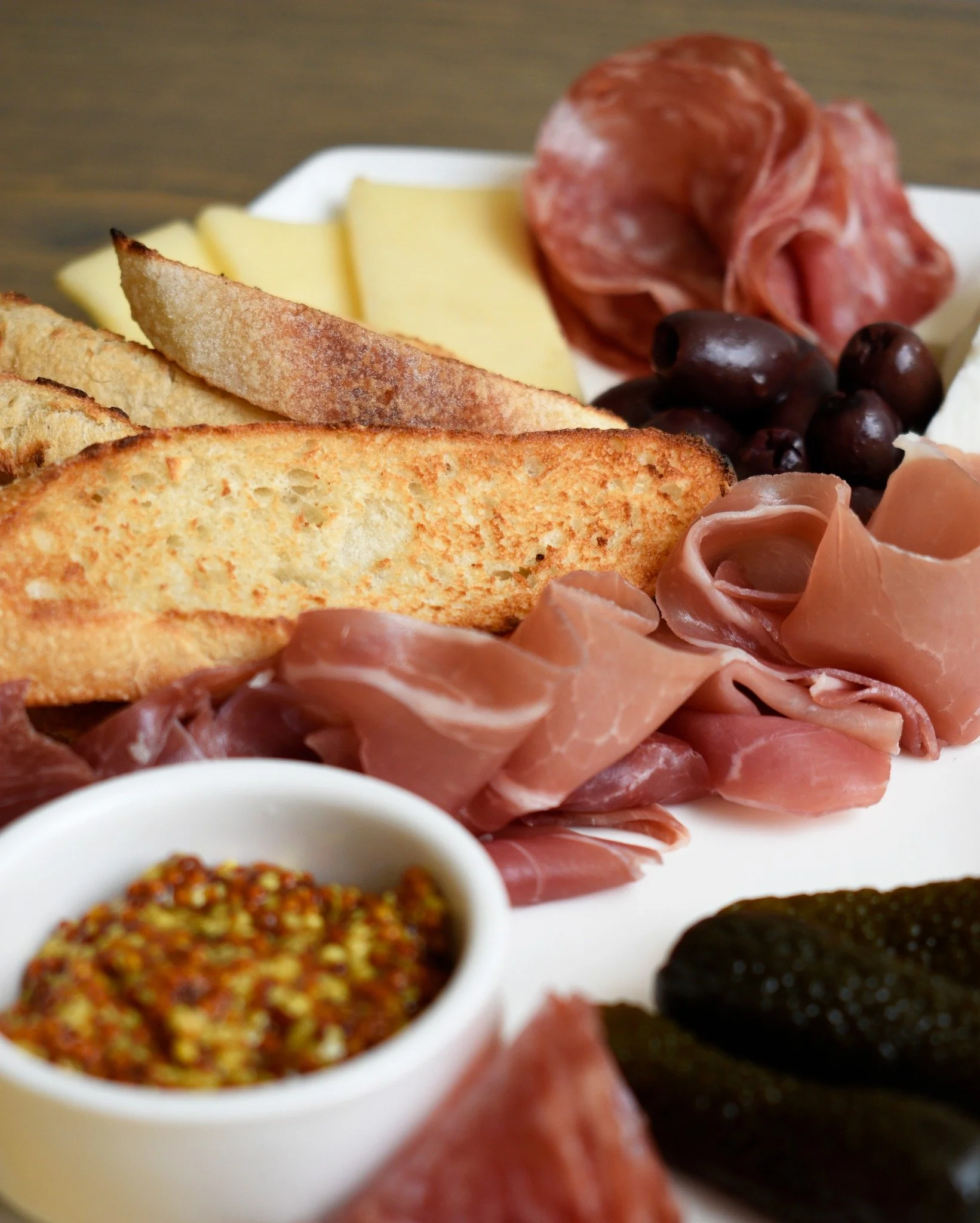 Have you tried our Charcuterie Board yet? Featuring local cheeses, cured meats, house-made condiment, and crusty bread this board is bursting with flavor! 
&middot;
Enjoy our Charcuterie Board at dinner tonight! 
&middot;
&middot;
#eriegrill #eriecan