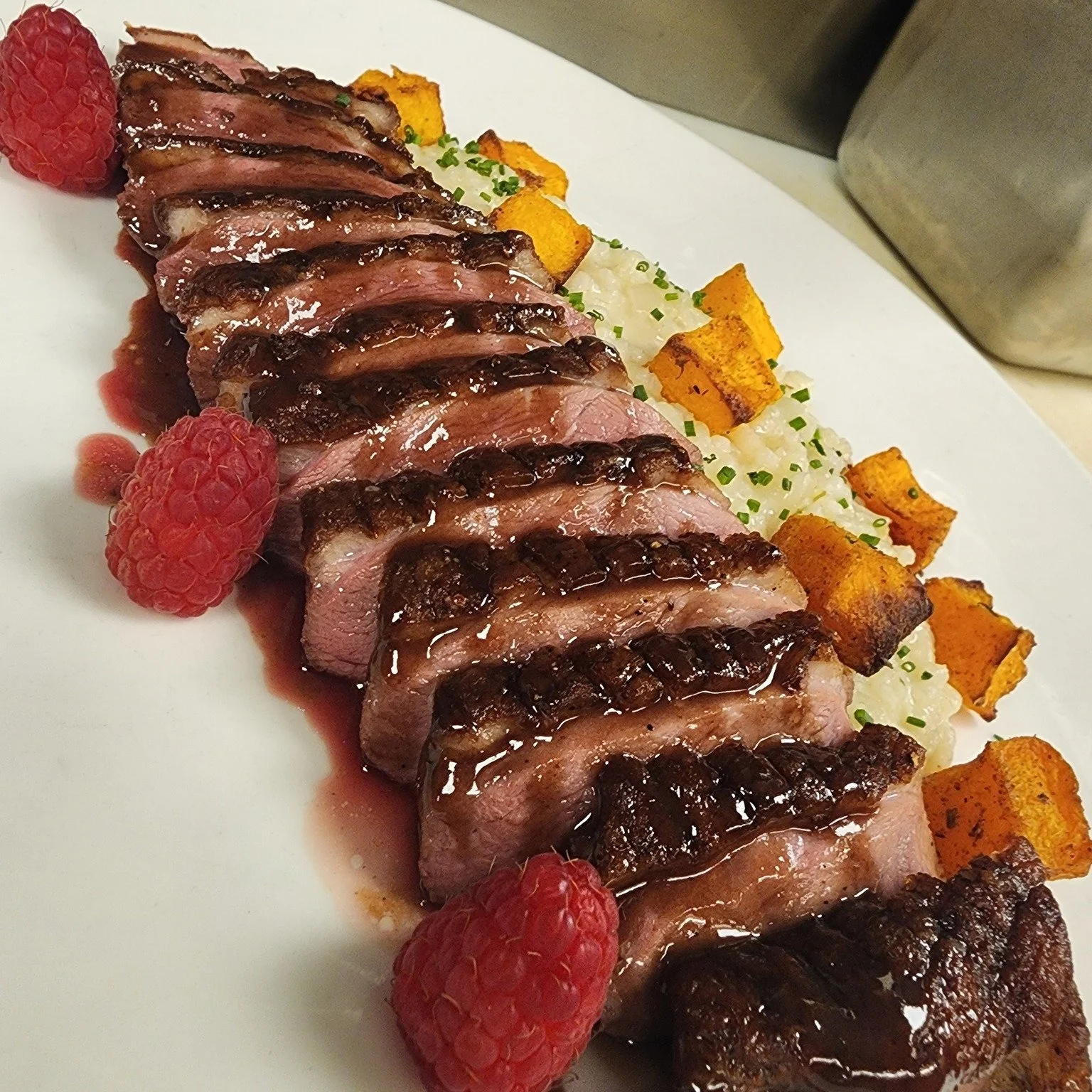 Say hello to the newest star on our dinner menu ⭐️

Hudson Valley Duck &mdash; 12oz magret duck, spicy butternut squash, parmesan risotto, and a bold raspberry port jus.

Seasonal flavors. Perfectly balanced. Absolutely worth the reservation.