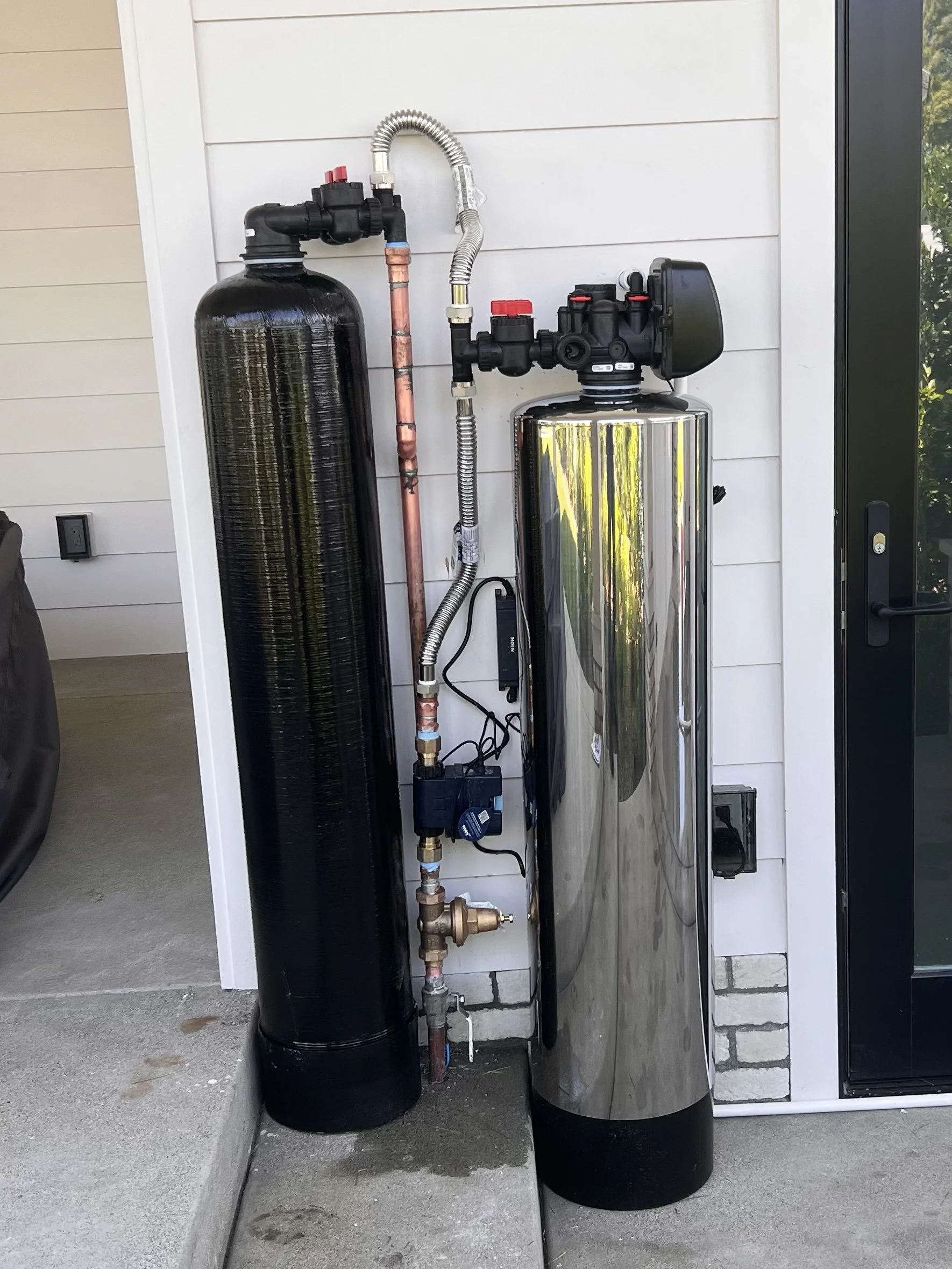 Whole house water filtration system and salt-free water softener installed at a home in La Jolla, California