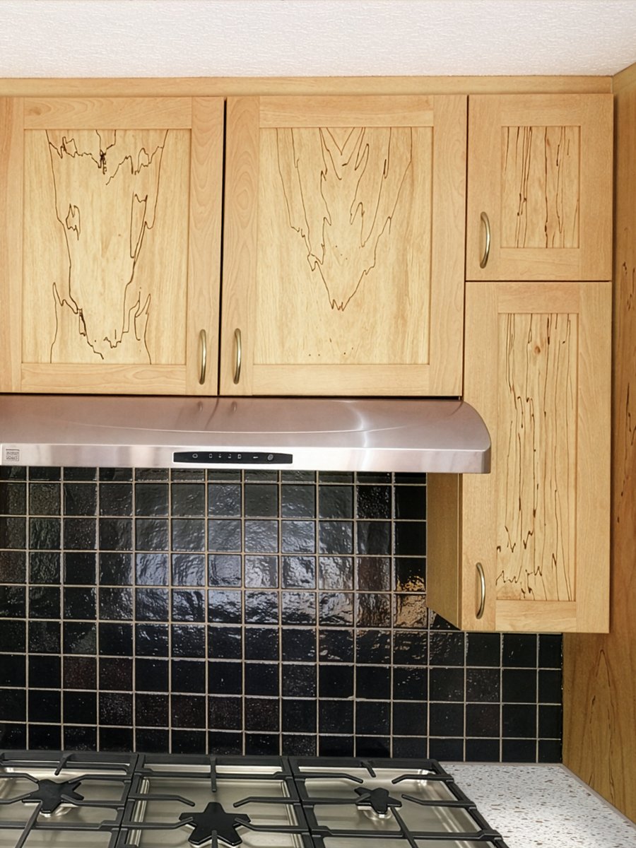 Closeup of bookmatched spalted maple custom cabinetry by ETaylor&Co