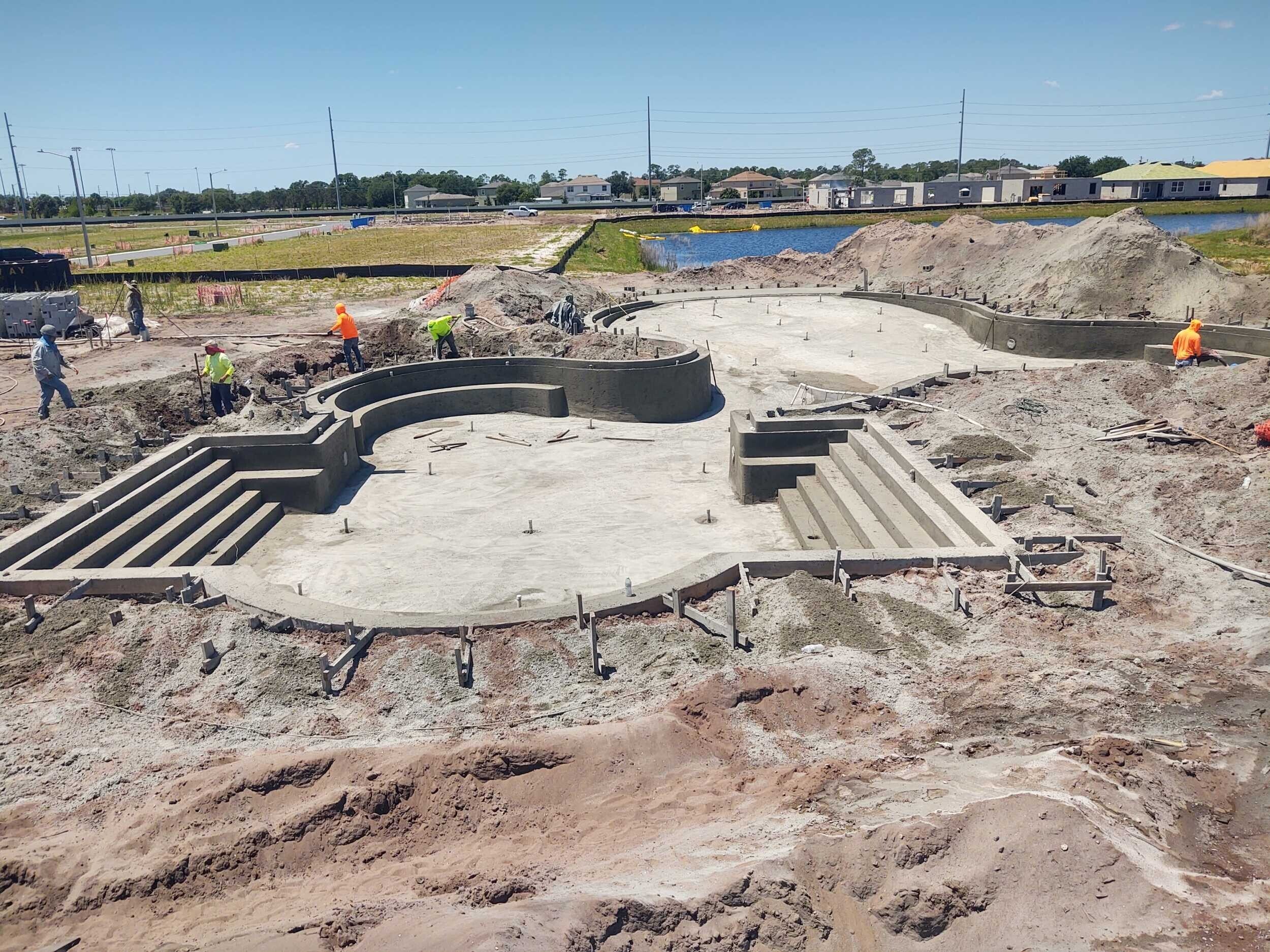 A commercial pool project with large steps.