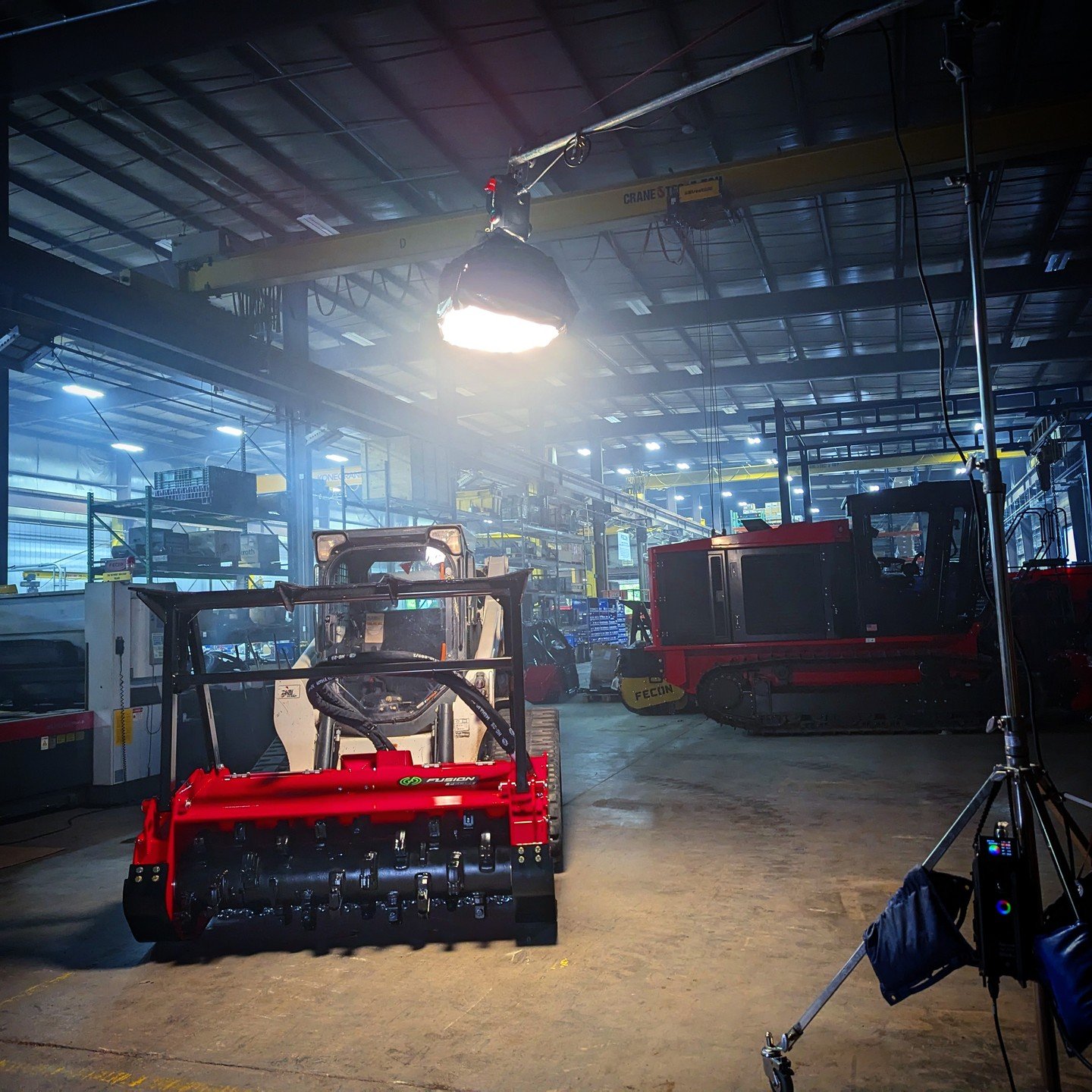 Bringing some spice into the wide shoot with a 12' menace arm.
The Project:
This BTS is from a shoot for Fecon (an equipment manufacturing company) I got to gaff this summer. We got to do some pretty fun, stylized set ups!
The Lighting:
For this se