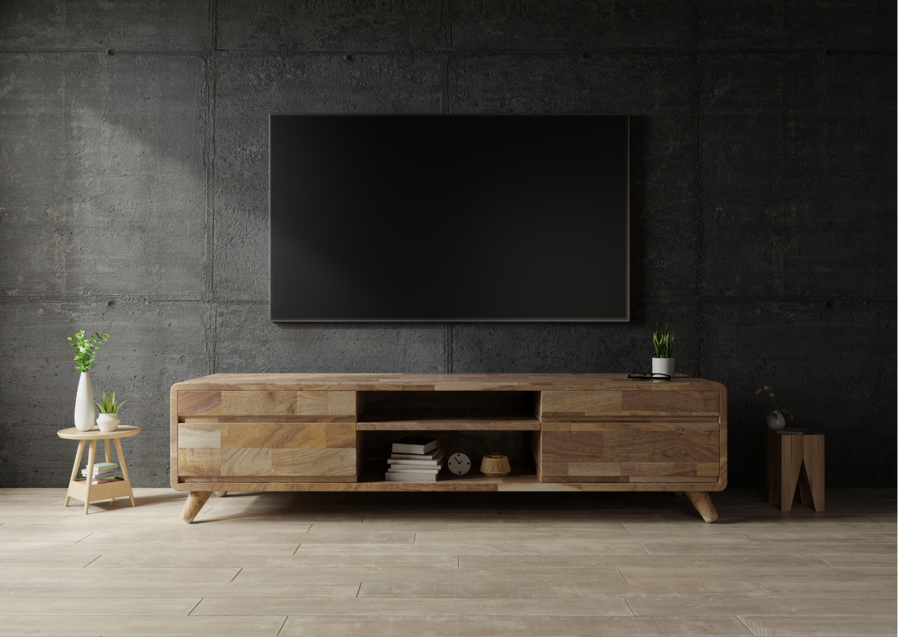 Living room with a flat-screen TV mounted on a dark concrete wall, wooden TV stand, and small potted plants on side tables.