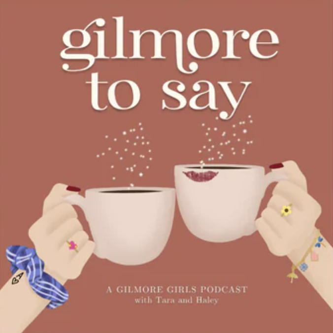 Podcast cover titled 'Gilmore to Say' featuring two hands holding coffee mugs, with animated arms showing rings, bracelets, and a blue scrunchie, against a rose background.