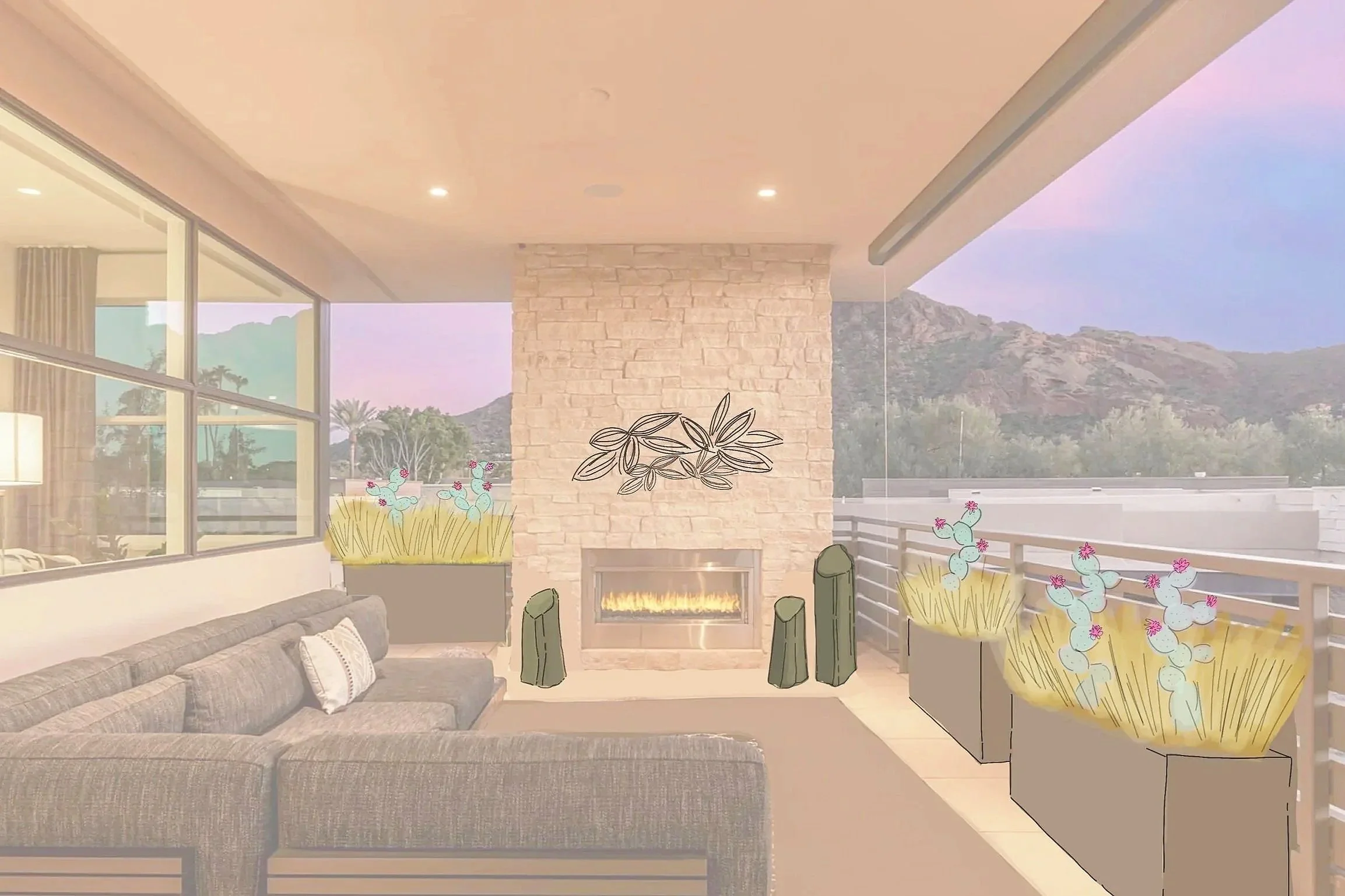 Living room with stone fireplace, large gray sectional sofa, potted cacti with pink flowers, mountain view outside, and a wall-mounted art piece above the fireplace.