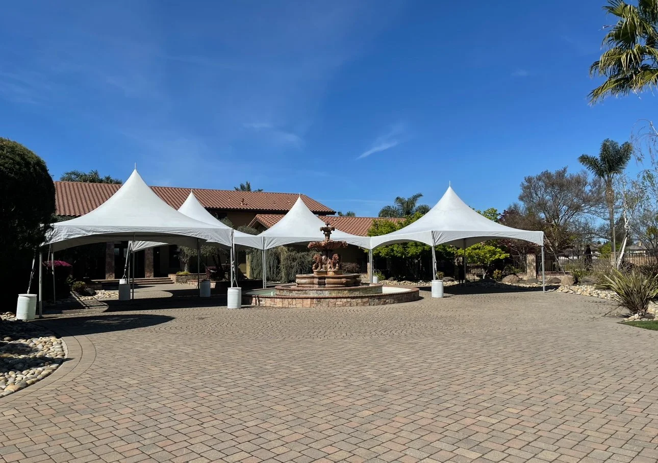 Marquee tents at a house for a wedding.