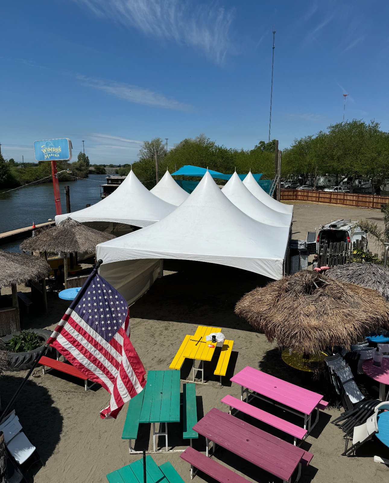 Riverside event with 20x20 tents and a beautiful view.