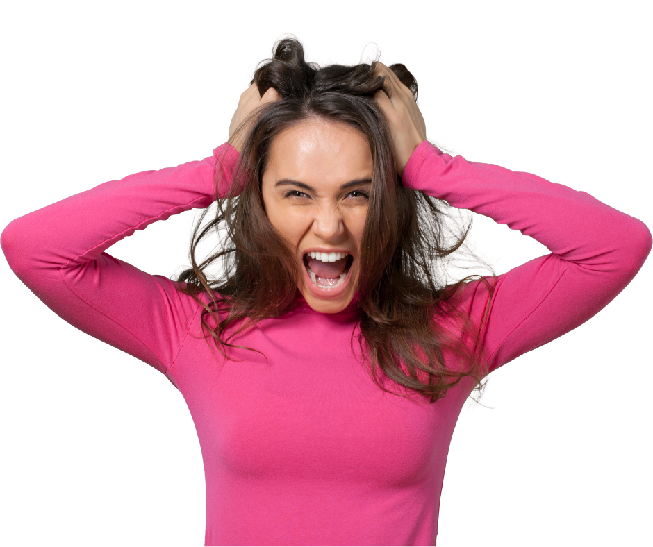A woman with brown hair wearing a pink long-sleeve shirt, holding her head with both hands, yelling or screaming, expressing frustration or anger.