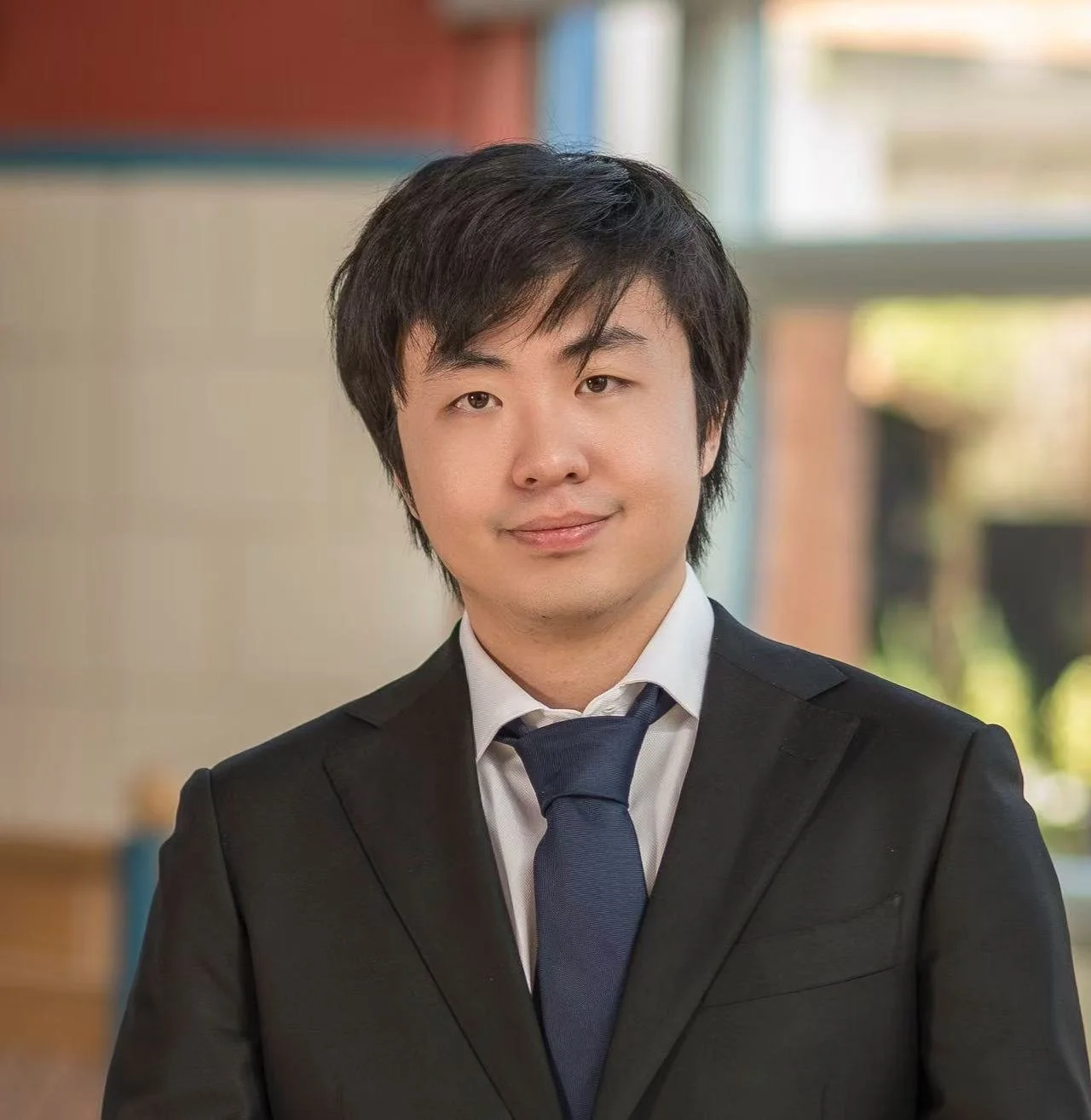 Riki Zheng, Diretor de Iniciativas Sociais