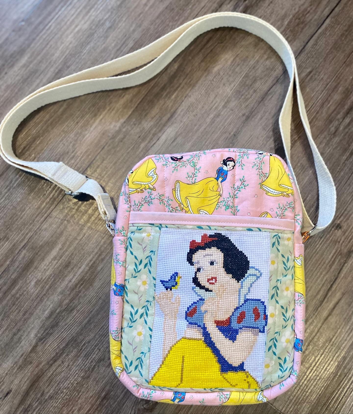 Disney Snow White Quilted Crossbody Bag. Handmade Cross-stitch added to the front pocket. #snowwhite #handmade #crossbodybags #quiltedbag #disney