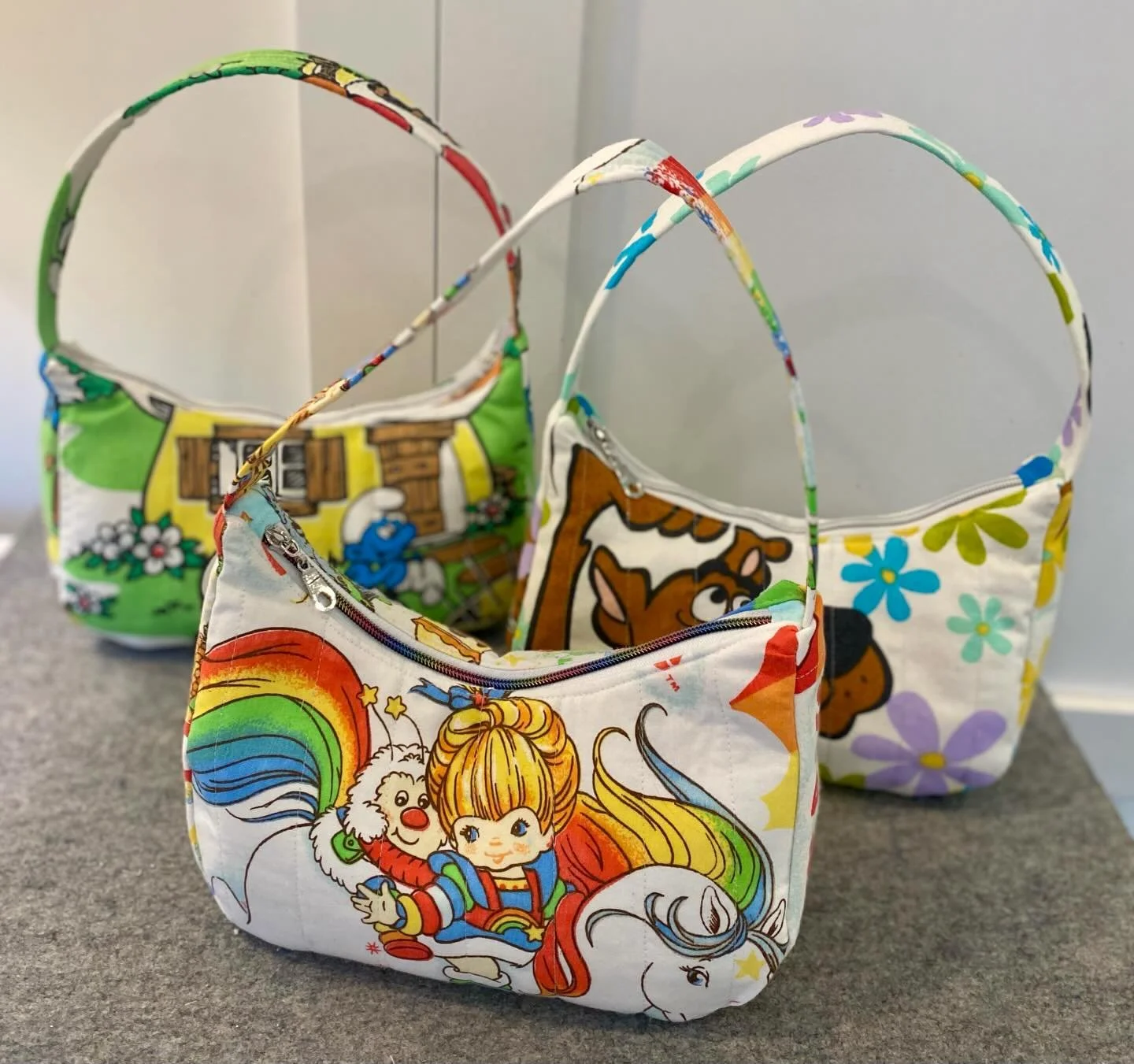 Upcycled Shoulder Bags available now in my shop. These 3 available now. More coming soon. #rainbowbrite #smurfs #scoobydoo #shoulderbag #upcycledbag