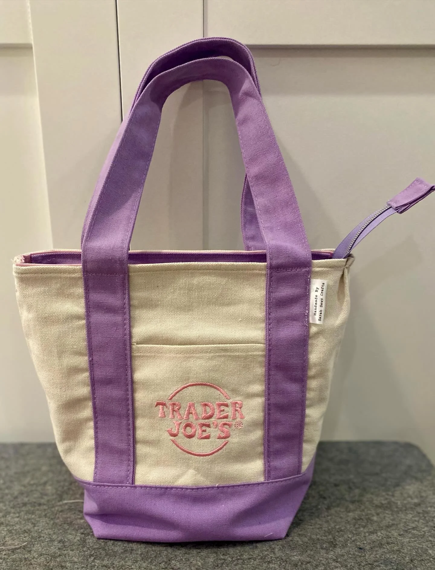 Update SOLD. Trader Joe&rsquo;s Mini Tote with added liner, pockets and zipper. #traderjoes #traderjoestote #reworkedtote