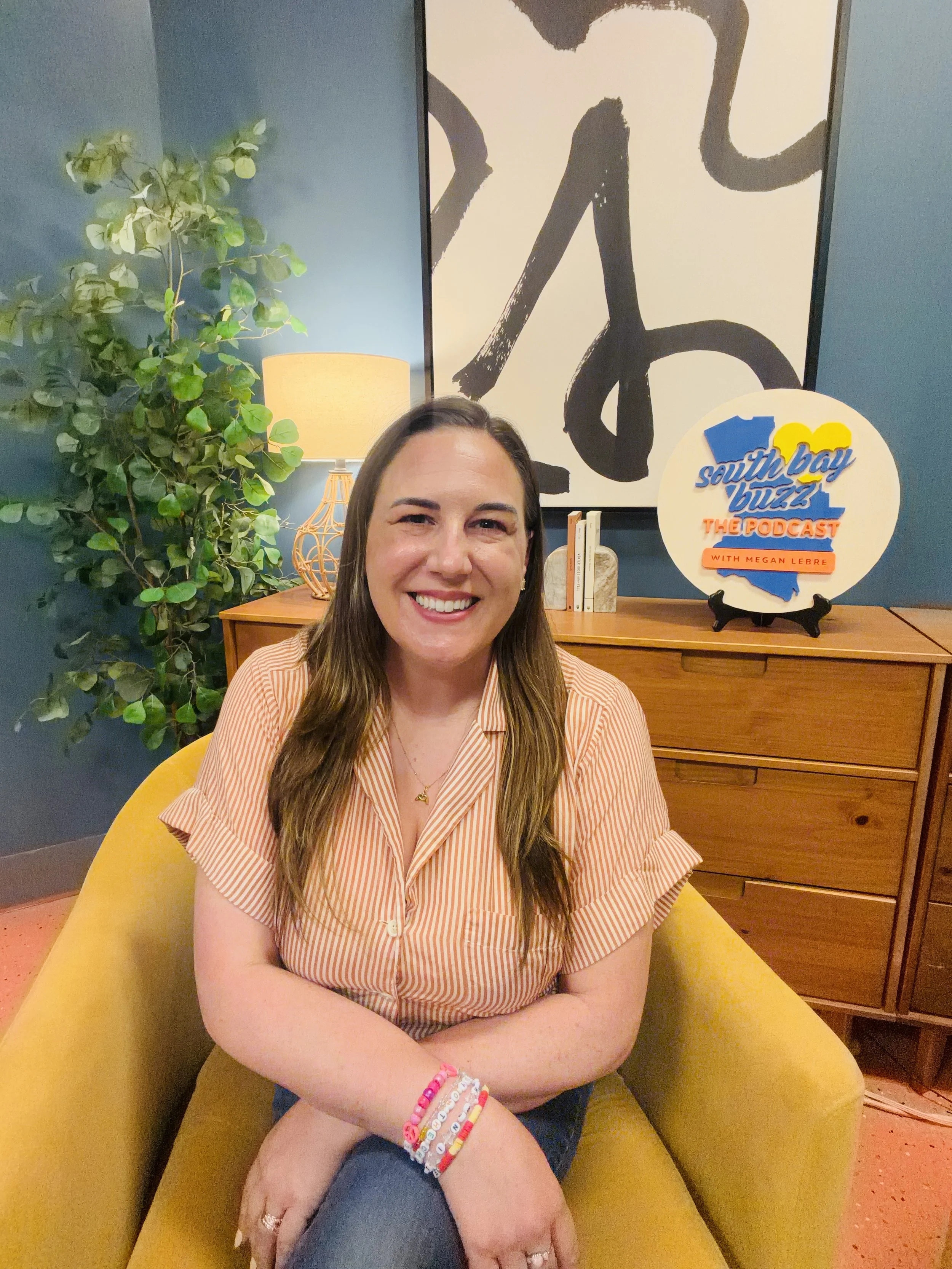 Megan Lebre in podcast studio space