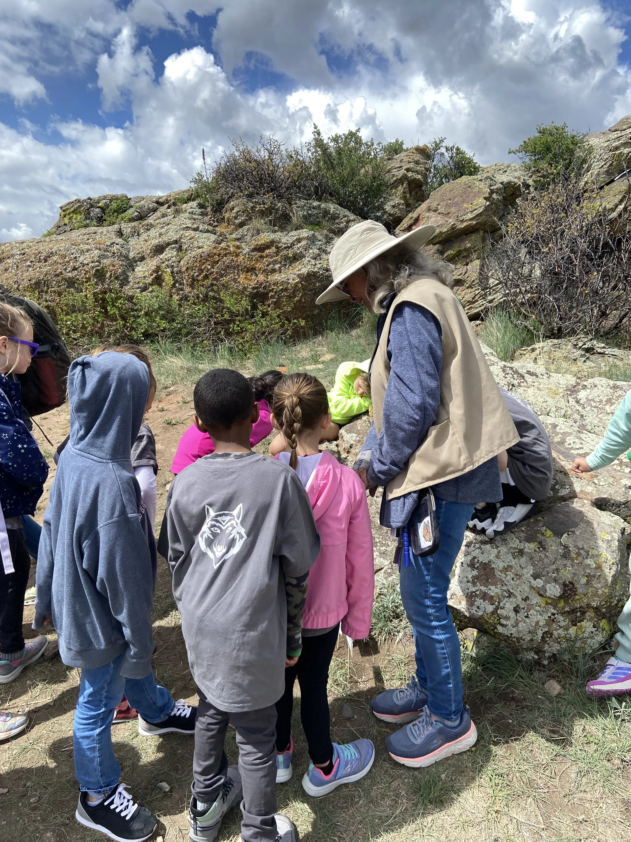 field trip- rita looking down rock bckgrd.jpg