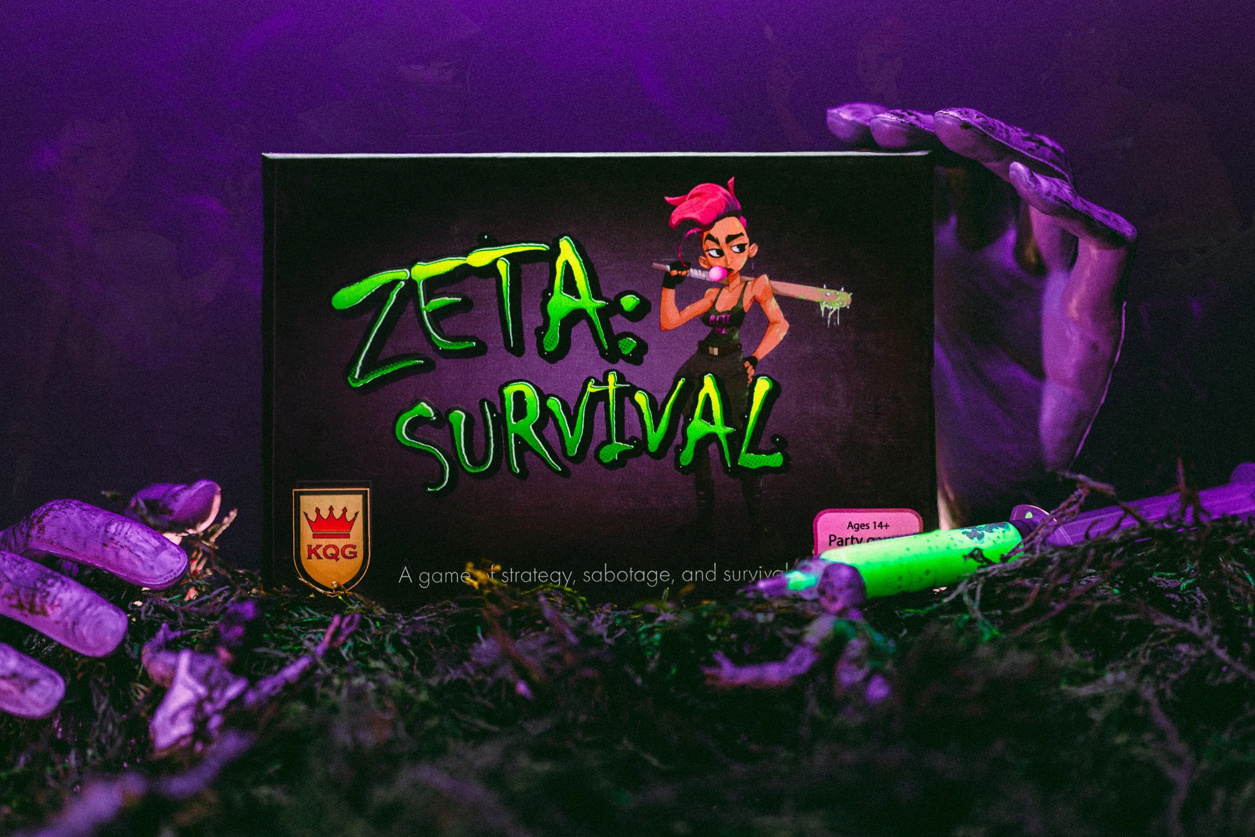 ZETA Survival game box with zombie hands on moss under purple lighting, product photography by James Brasier