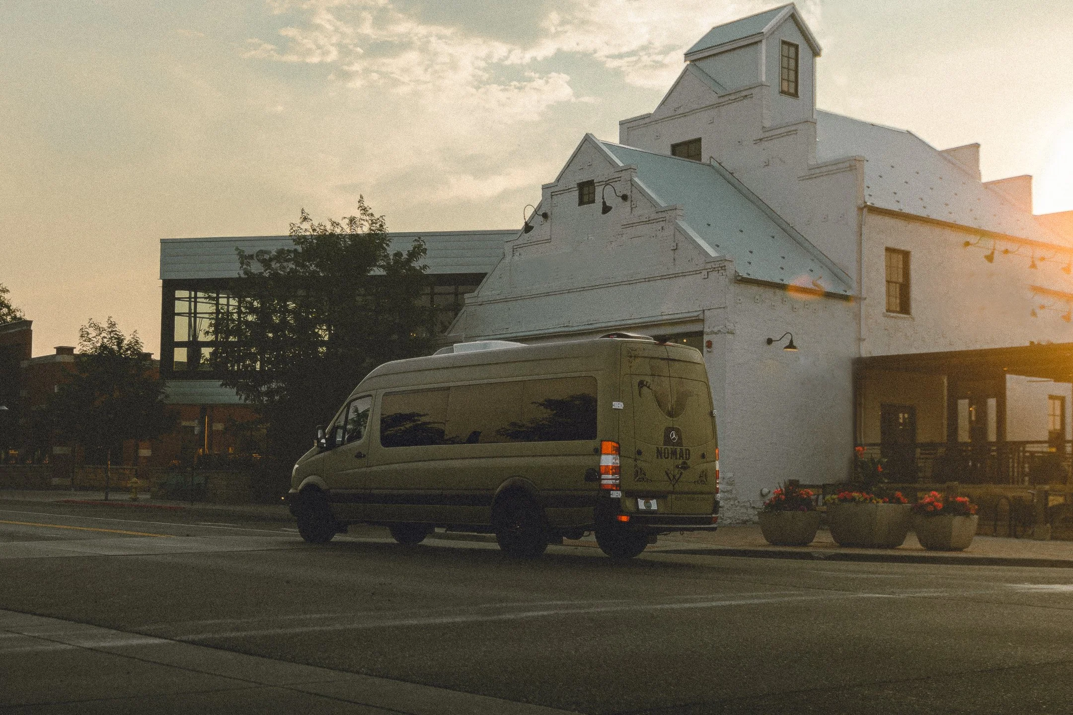 Nomad Mobile Barbershop van parked at golden hour, brand lifestyle campaign by Colorado commercial photographer James Brasier