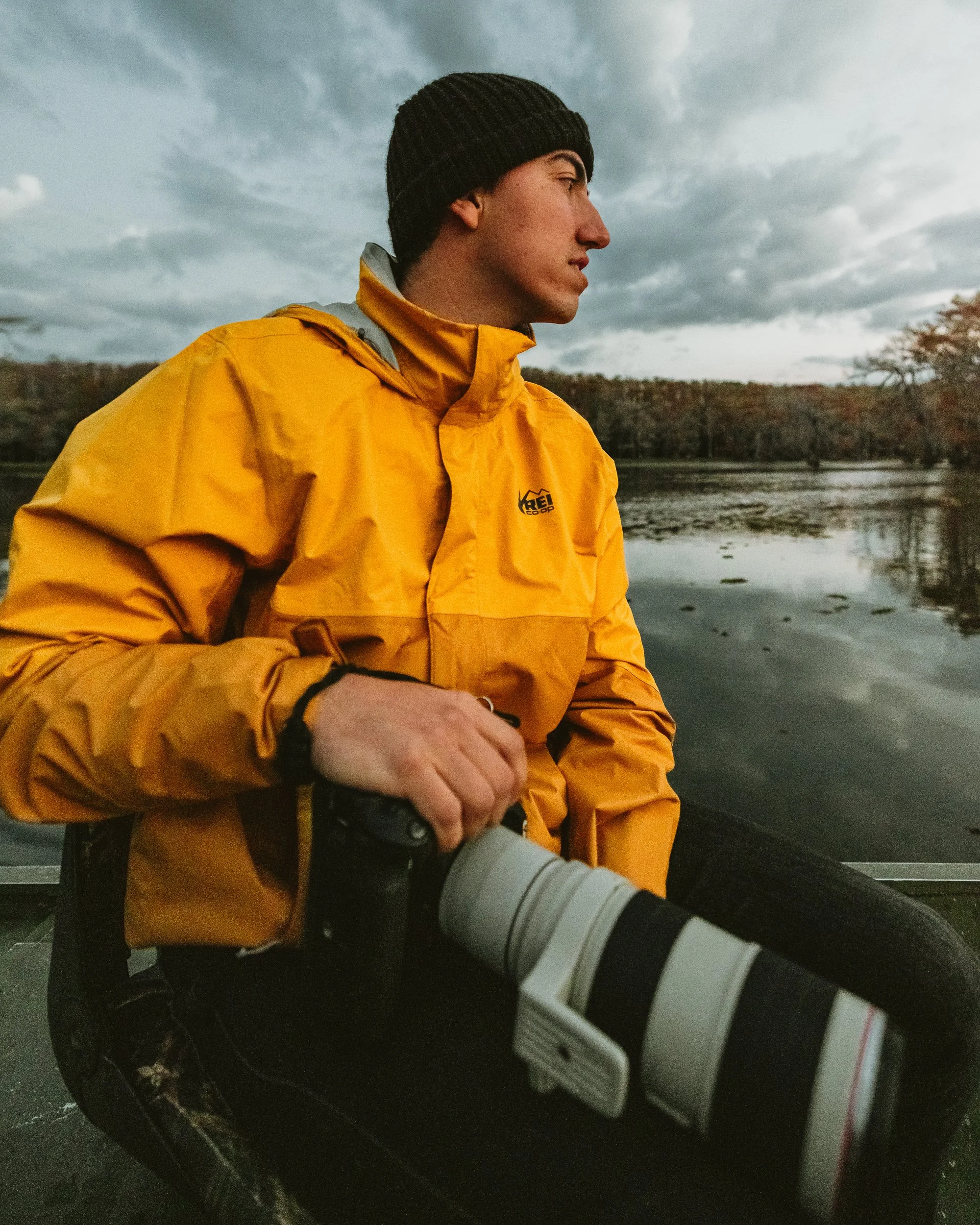 Outdoor photographer James Brasier on location at Caddo Lake Texas with camera and telephoto lens