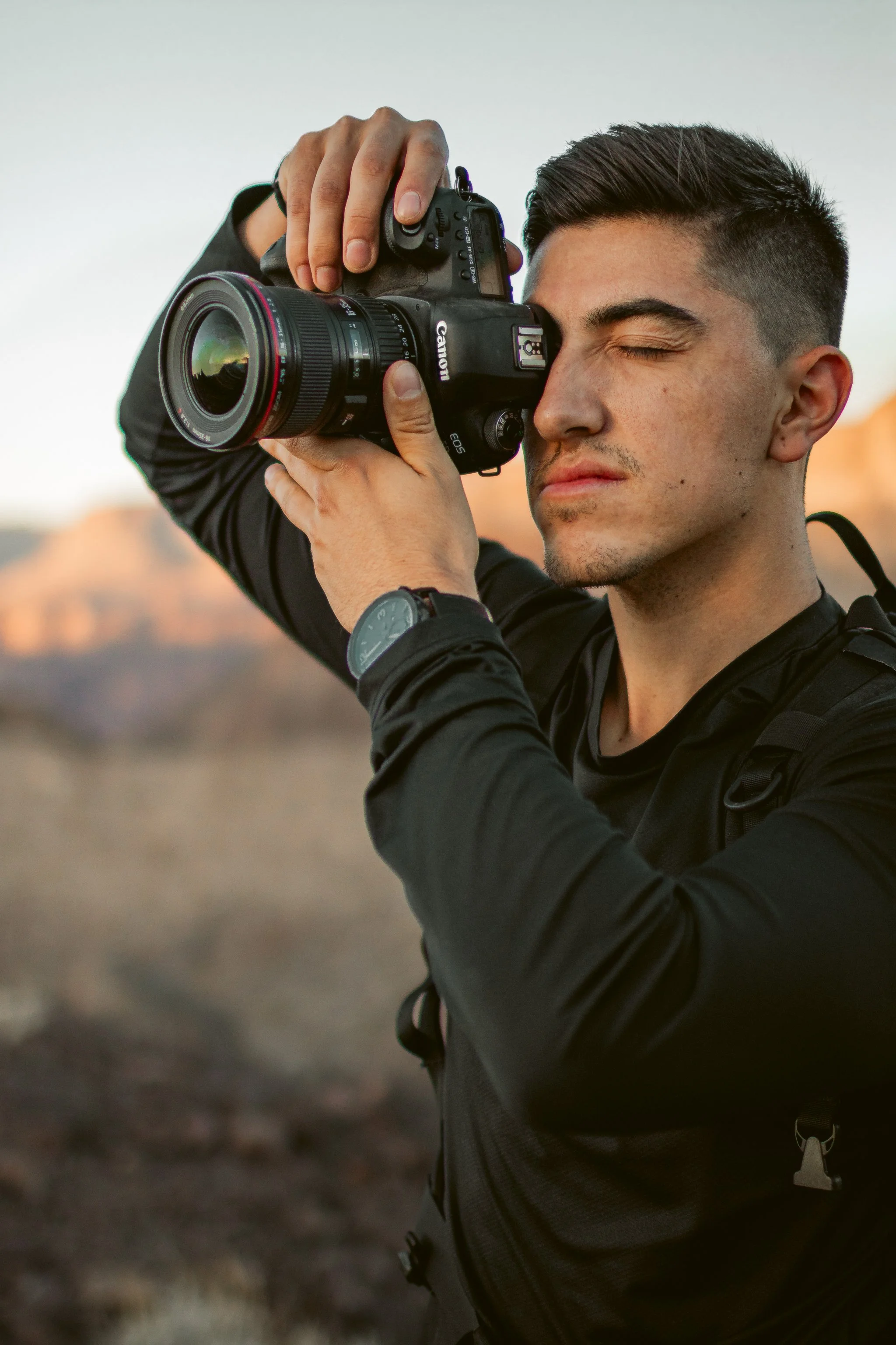 Colorado commercial photographer James Brasier shooting with Canon DSLR at golden hour in the desert