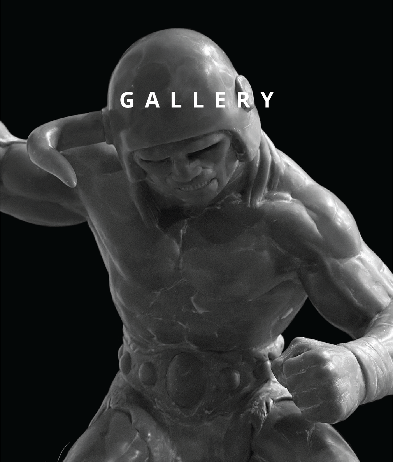 A resin sculpture of a barbarian warrior in the midst of a striking pose.