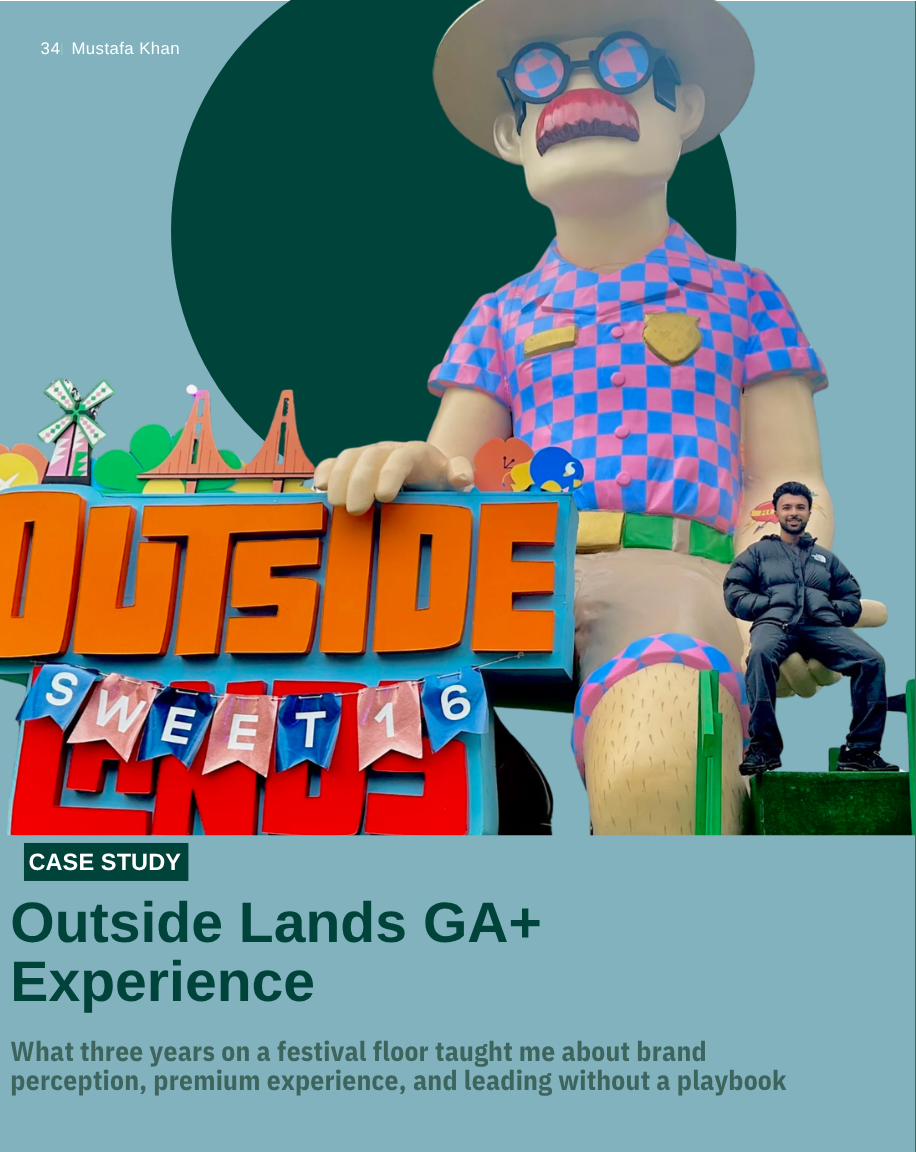 A large outdoor figurine of a man wearing sunglasses, a hat, a checkered shirt, and shorts, holding a sign that says 'OUTSIDE'. A person is sitting on the figurine's hand. Colorful outdoor decorations and a sign reading 'SWEET 16' are also visible.