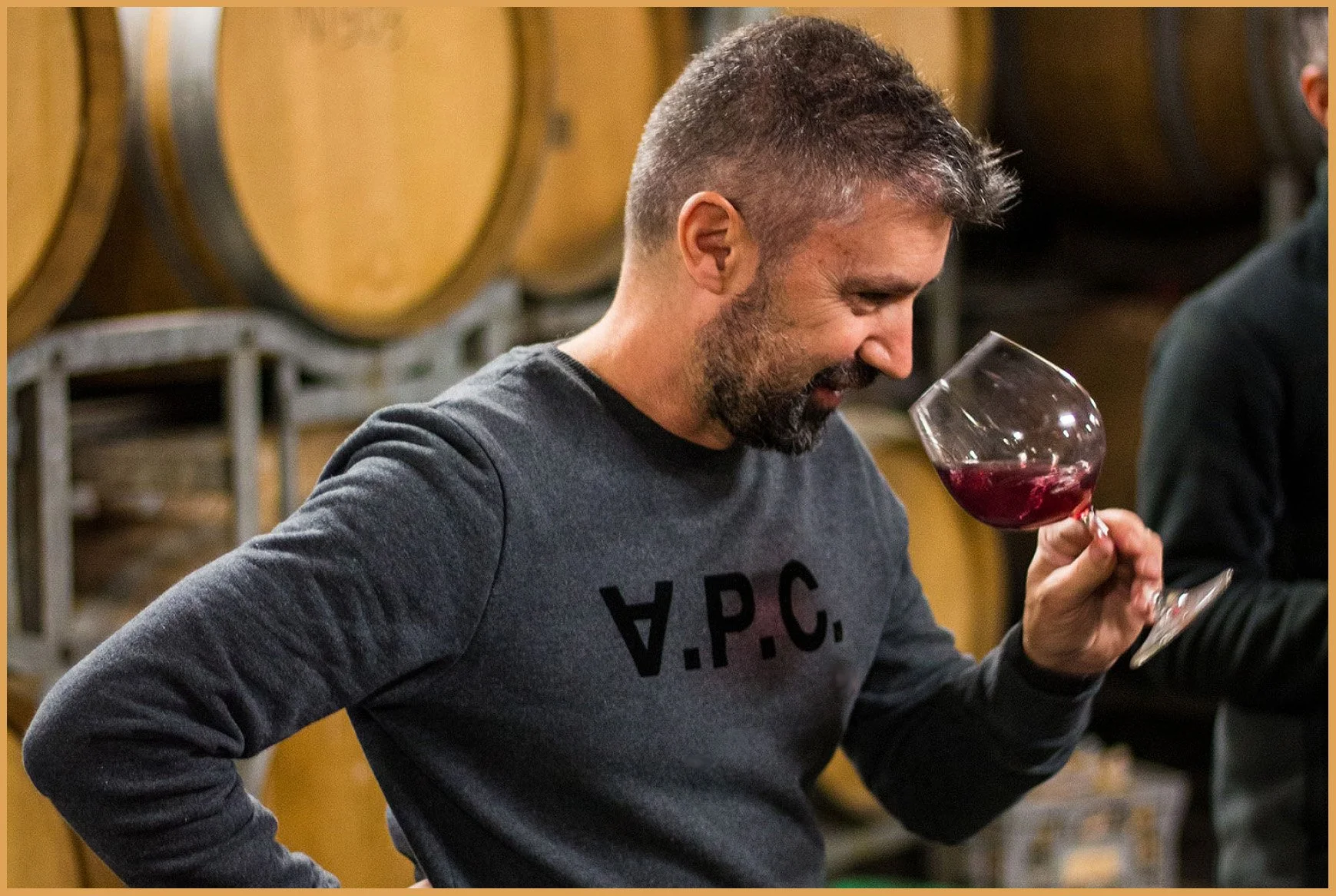 Anthony D’Anna tasting wine in the family cellar