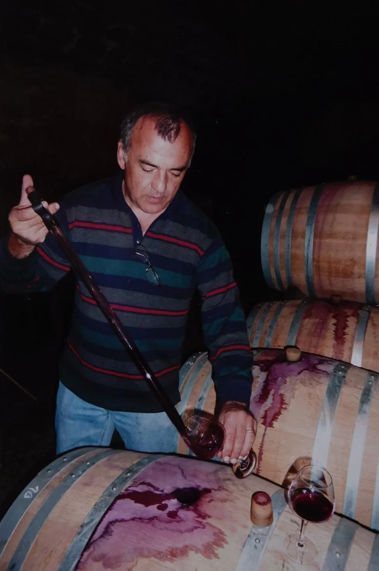 Dominique Gallois drawing Pinot Noir from a barrel in the Gevrey-Chambertin cellar