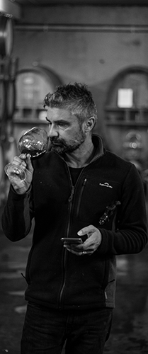 Franco D’Anna tasting DML Vin Pinot Noir in the winery