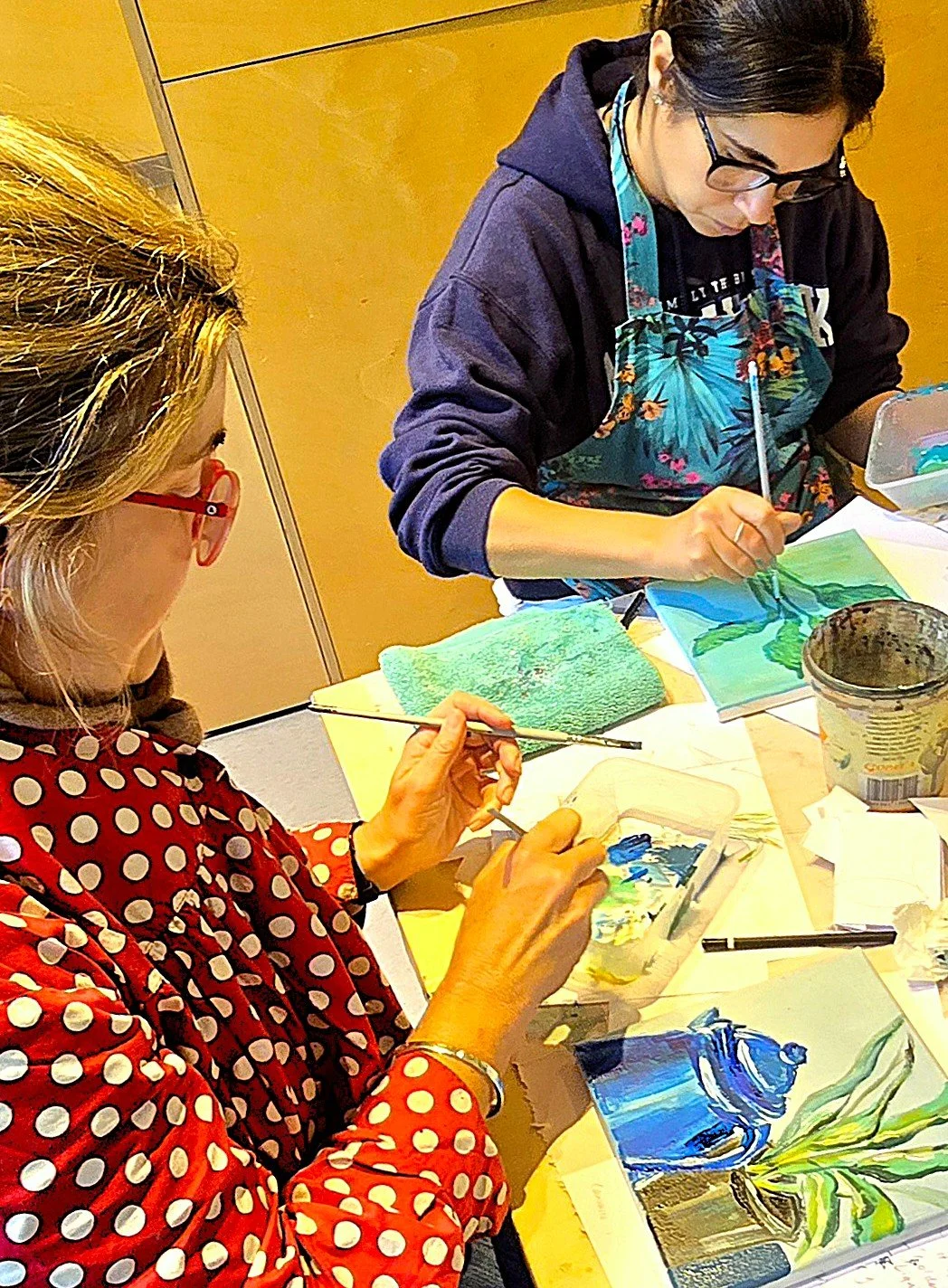 2 women painting in Larisse Hall's Painting Class
